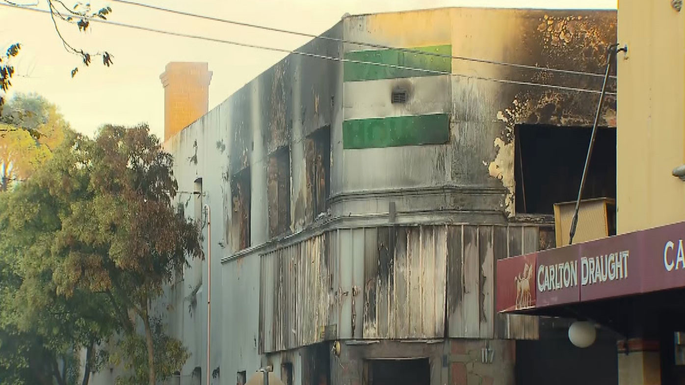 Police investigating after one person killed in a boarding house fire in Newtown.