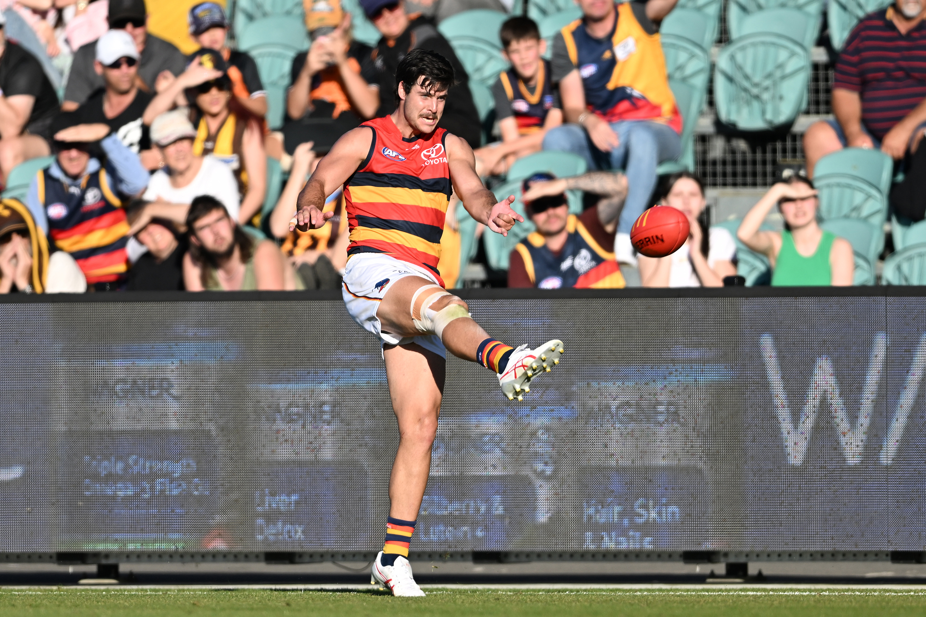 LAUNCESTON, AUSTRALIA - APRIL 23: Darcy Fogarty of the Crows kicks a goal during the round six AFL match between Hawthorn Hawks and Adelaide Crows at University of Tasmania Stadium, on April 23, 2023, in Launceston, Australia. (Photo by Steve Bell/Getty Images)