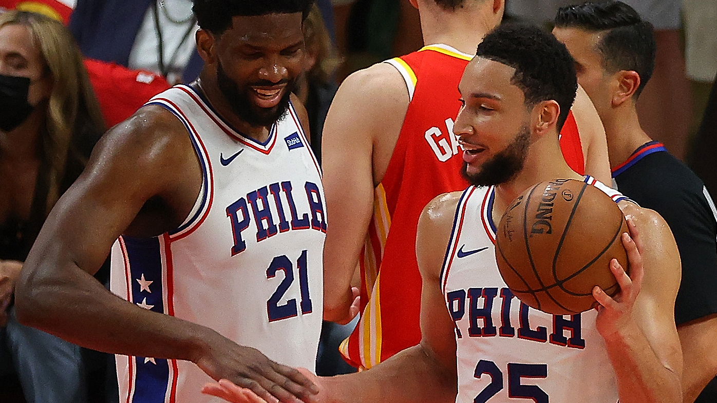 Ben Simmons #25 and Joel Embiid #21 of the Philadelphia 76ers 