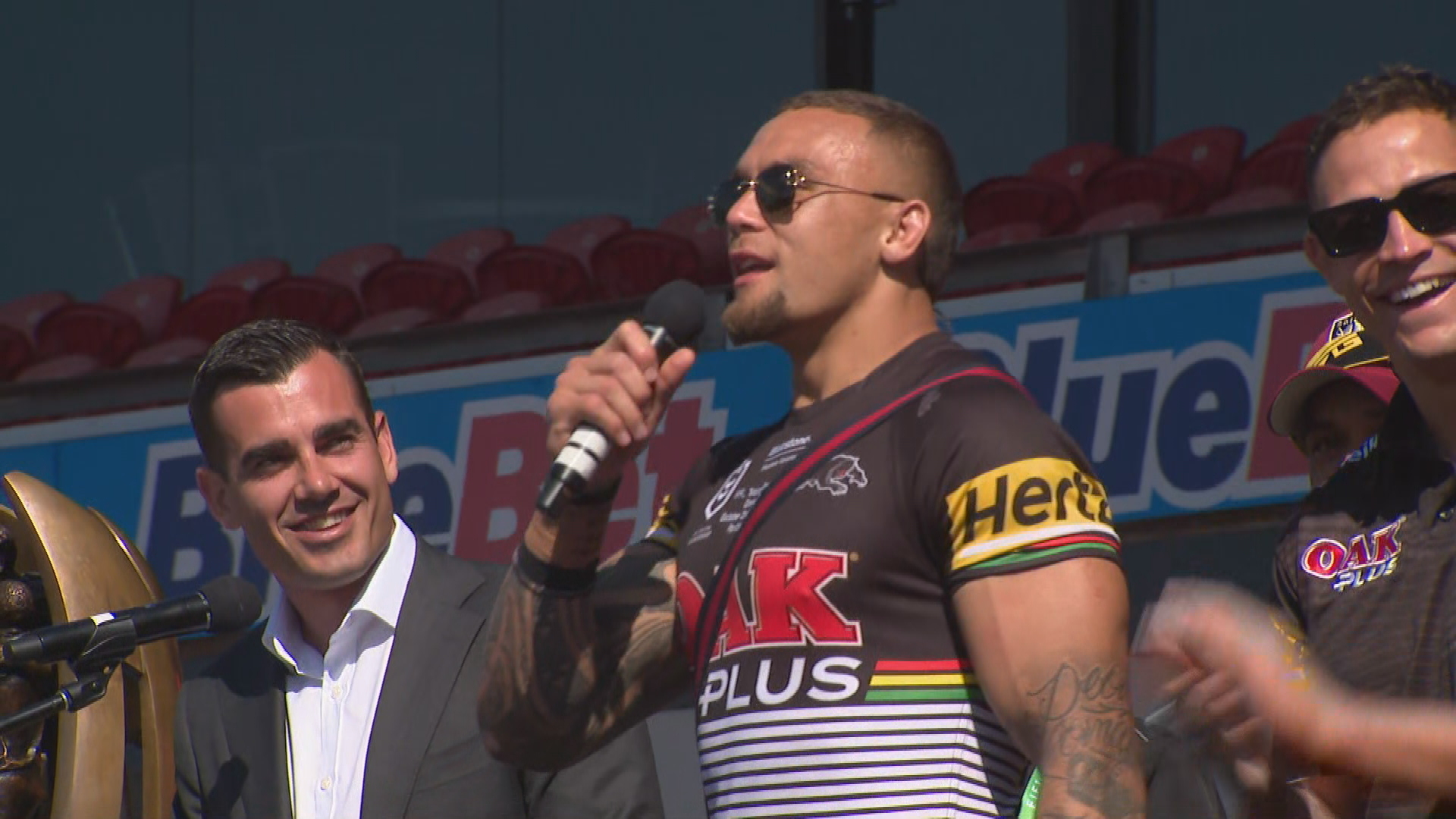 Penrith star James Fisher-Harris encourages the crowd at the premiership fan day.