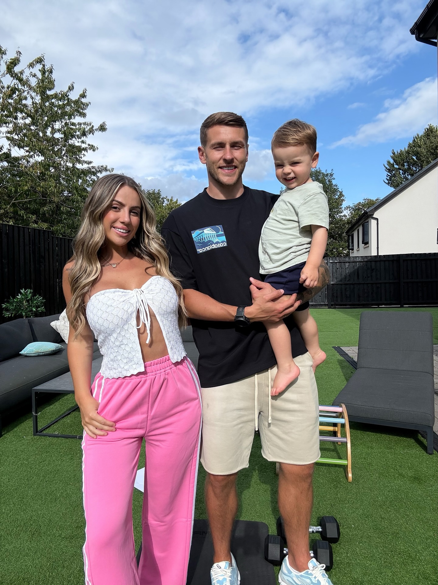 Holly Hagan with her husband and their son