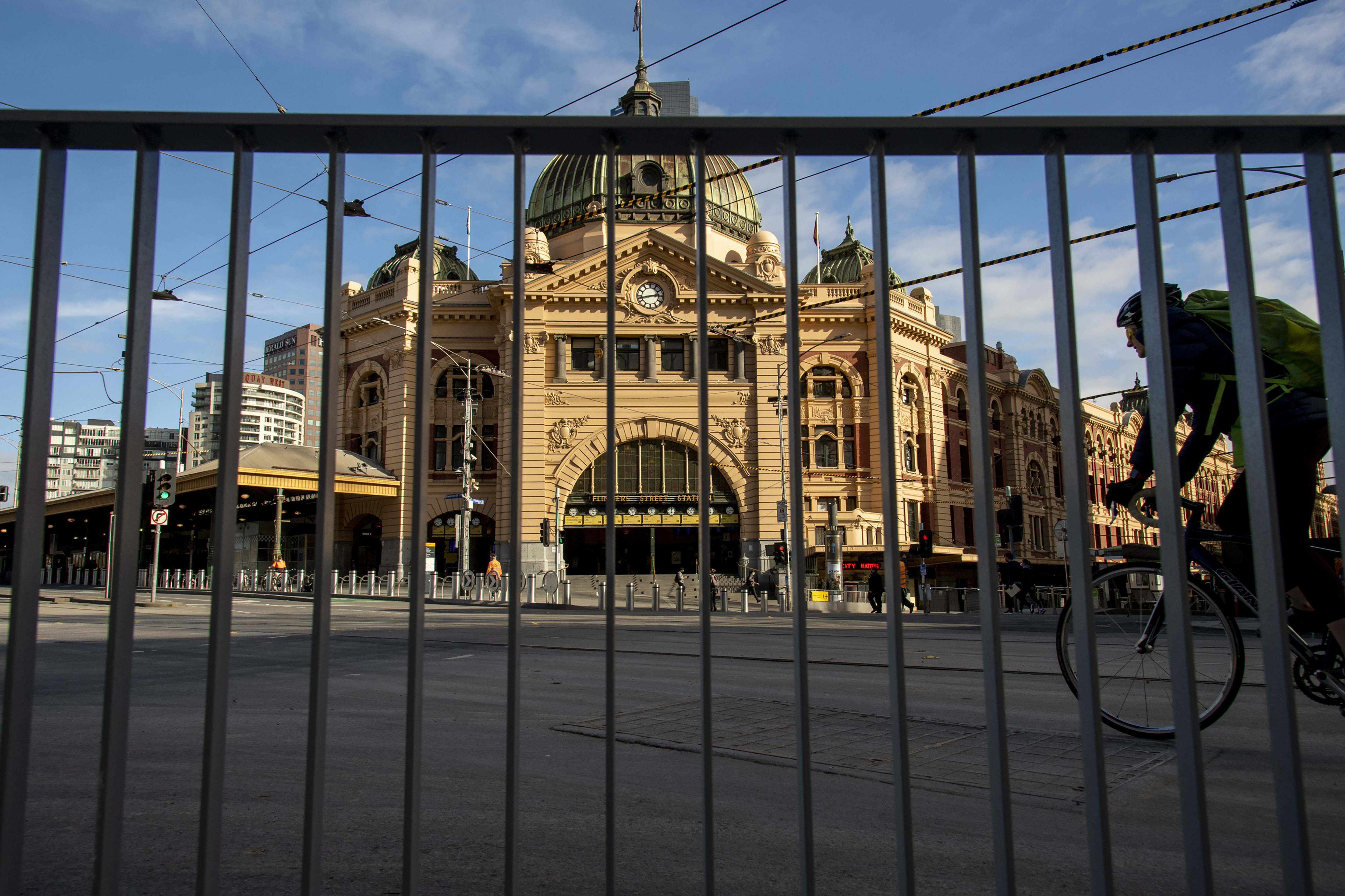 Flindres Street Station during lockdown due to the continuing spread of the coronavirus in Melbourne, Thursday, Aug. 6, 2020. Victoria state, Australia's coronavirus hot spot, announced on Monday that businesses will be closed and scaled down in a bid to curb the spread of the virus. (AP Photo/Andy Brownbill)