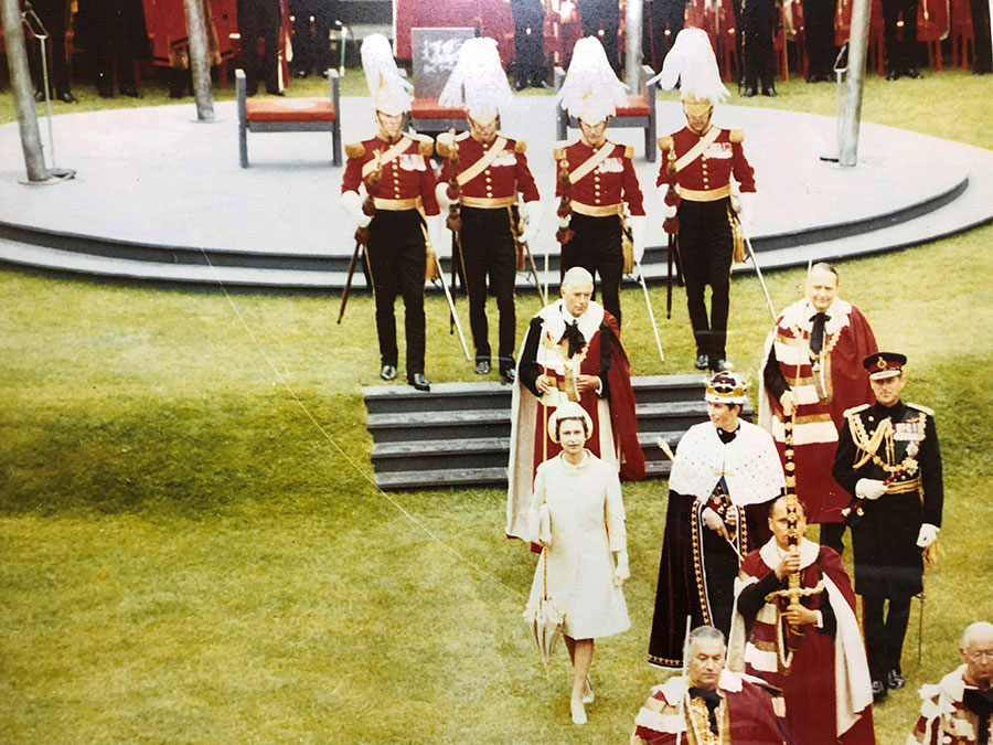 Prince Charles walks with Queen Elizabeth II and Prince Philip.