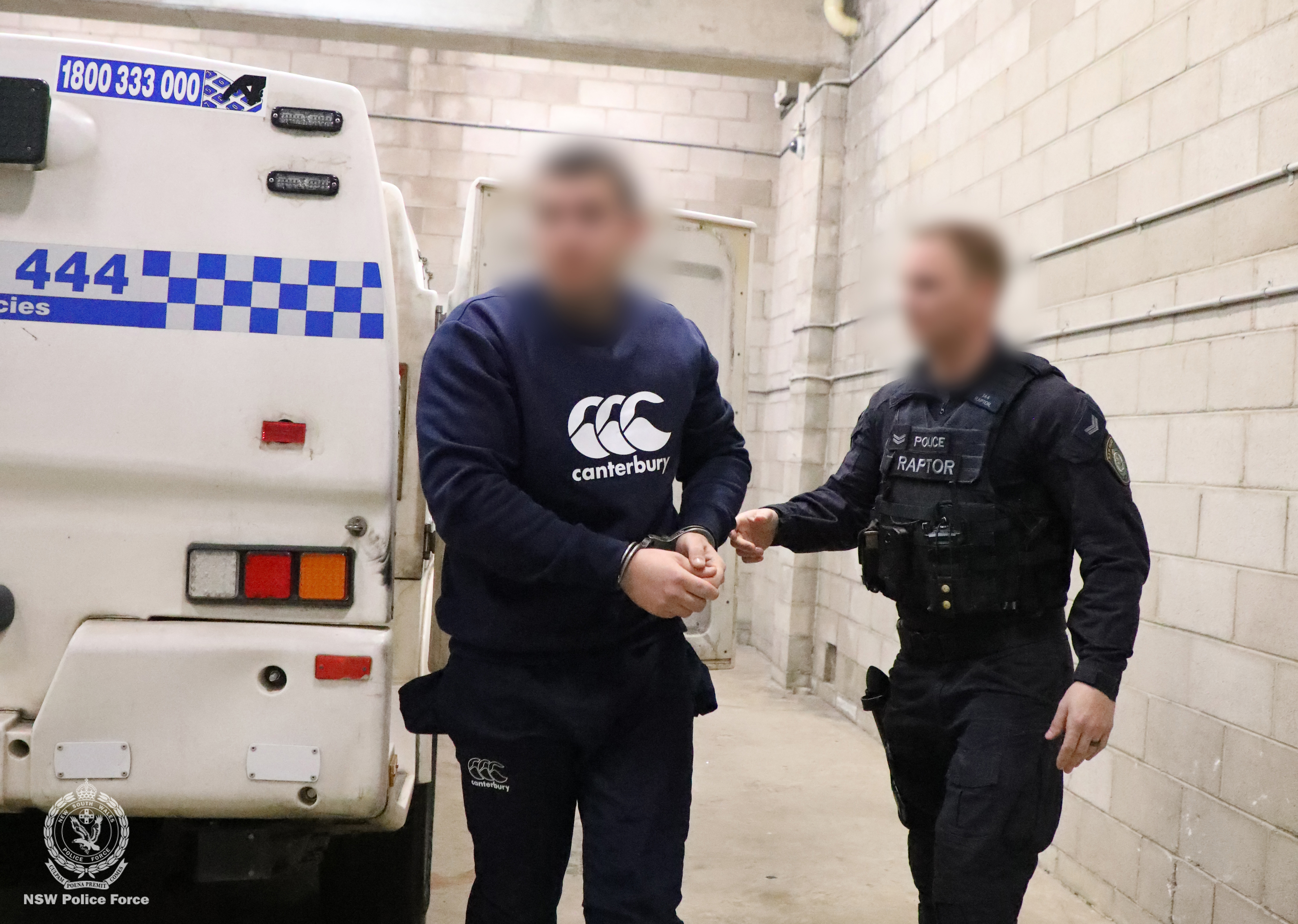 Rebels bikie charged over video of caged cat being shot at point blank