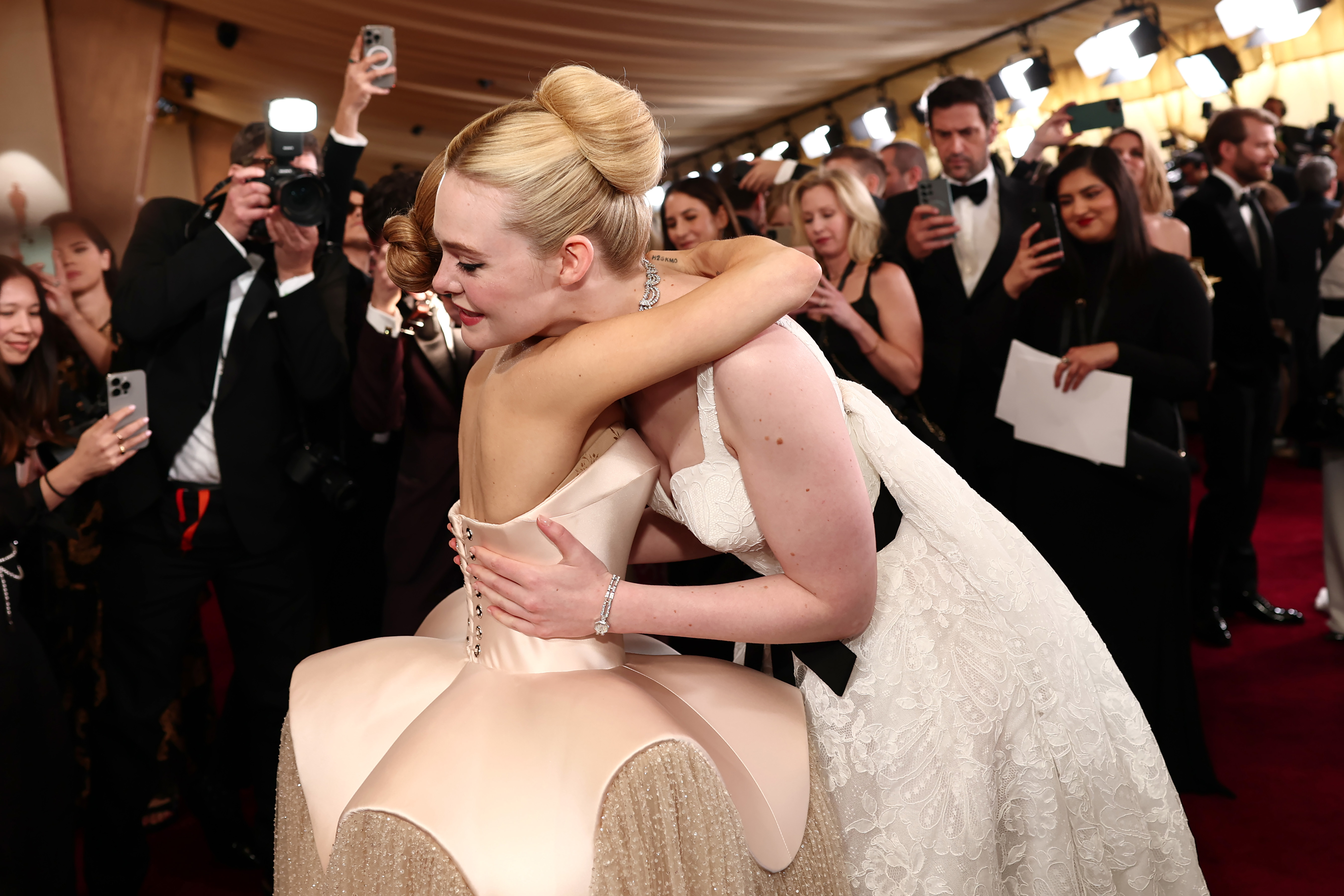 Ariana Grande and Elle Fanning attend the 97th Annual Oscars at Dolby Theatre on March 02, 2025 in Hollywood, California. 
