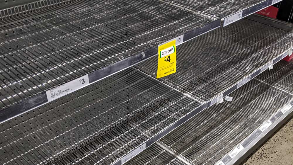 Empty supermarket shelves with coronavirus panic buying