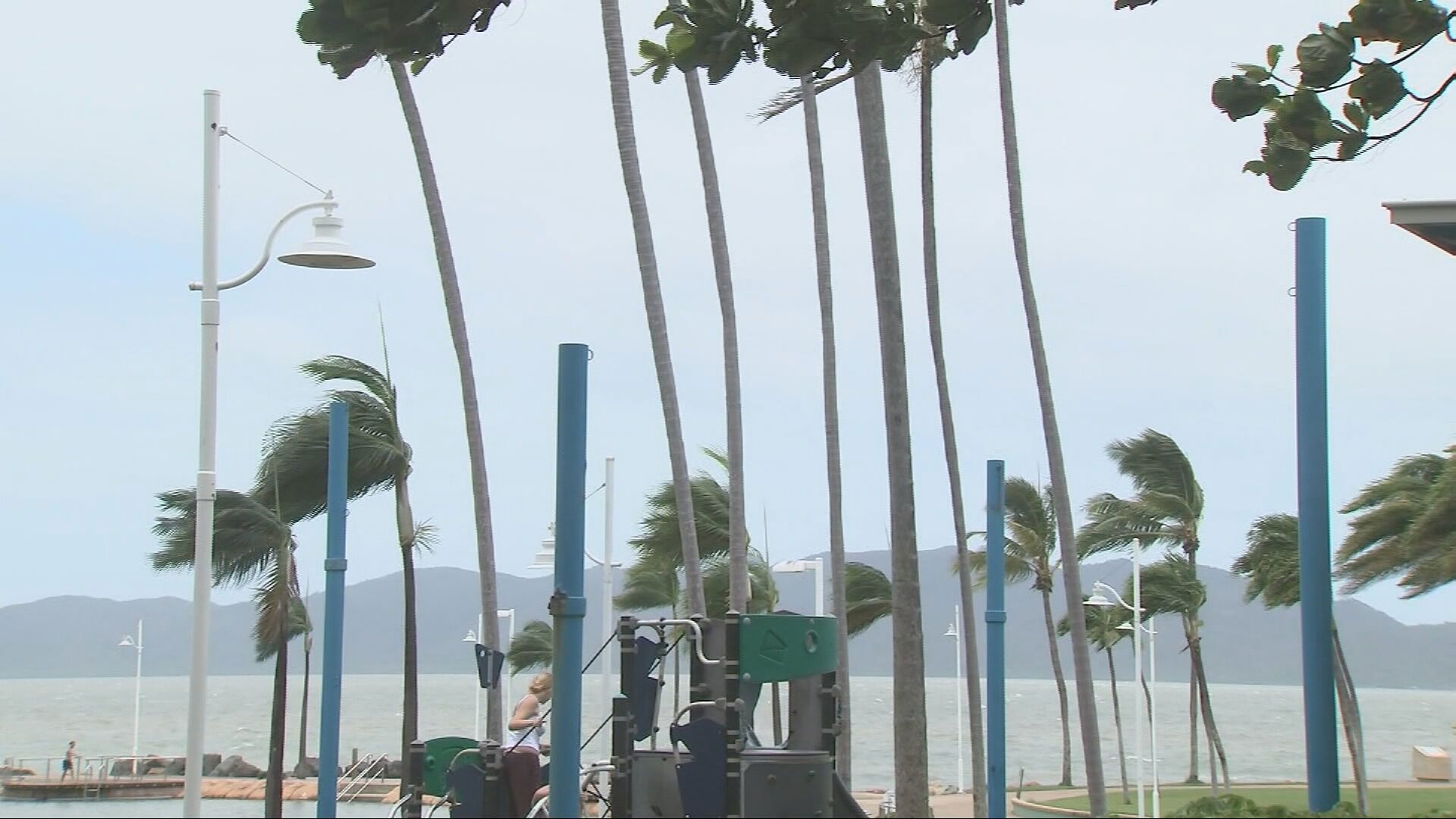 Tropical Cyclone Koji set to cross Queensland coast as Category 2 storm