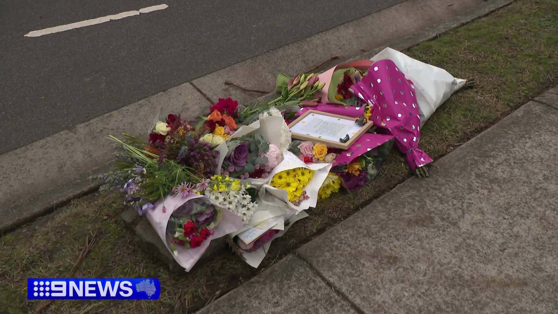 Flowers left by the road after the crash killed a couple in Melbourne.