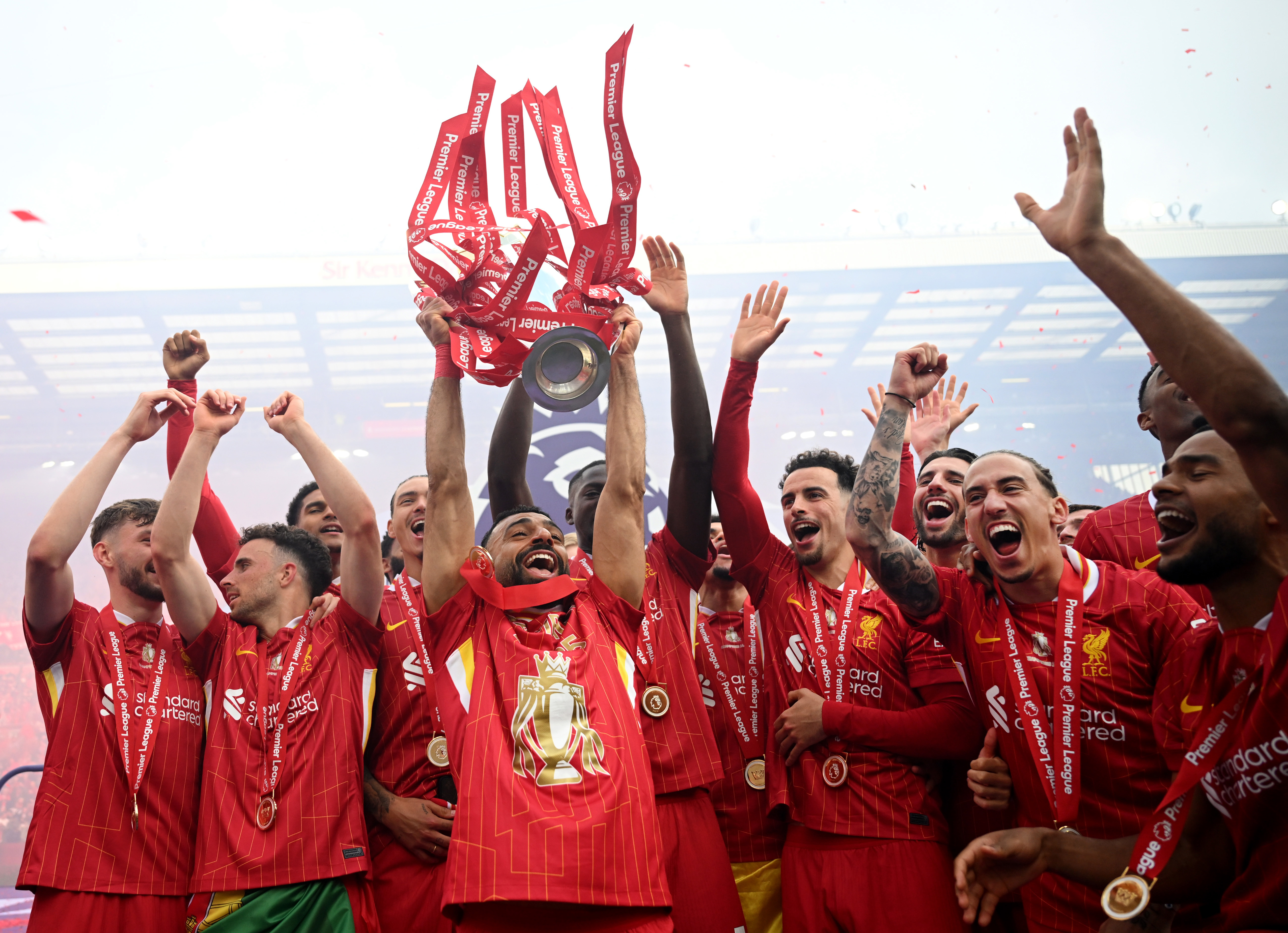 Liverpool celebrates winning the 2024-25 Premier League trophy.
