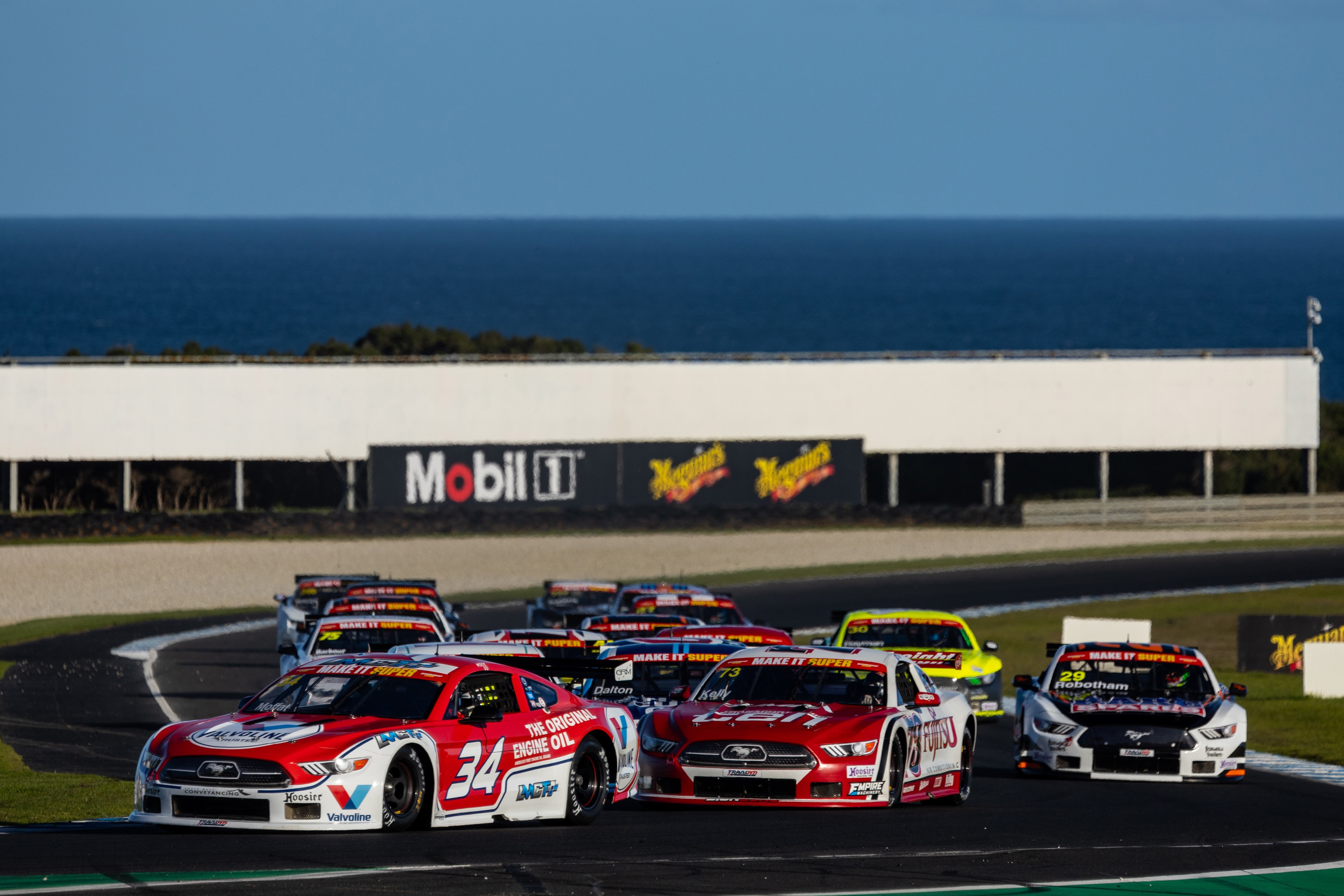James Moffat leads Owen Kelly into the turn three hairpin, dubbed Miller Corner. 