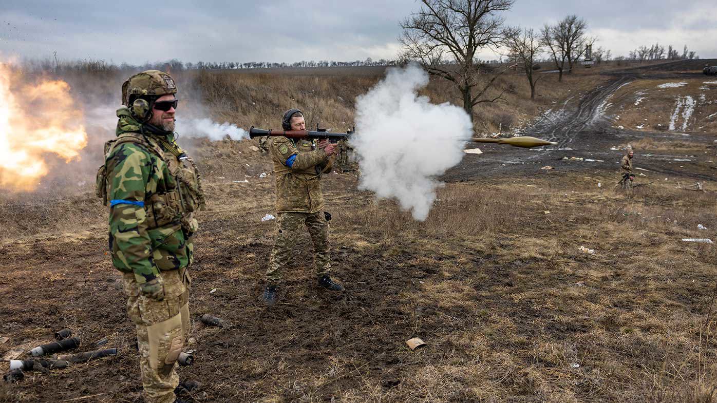 A Ukrainian soldier fires a rocket launcher in the Donbas region.