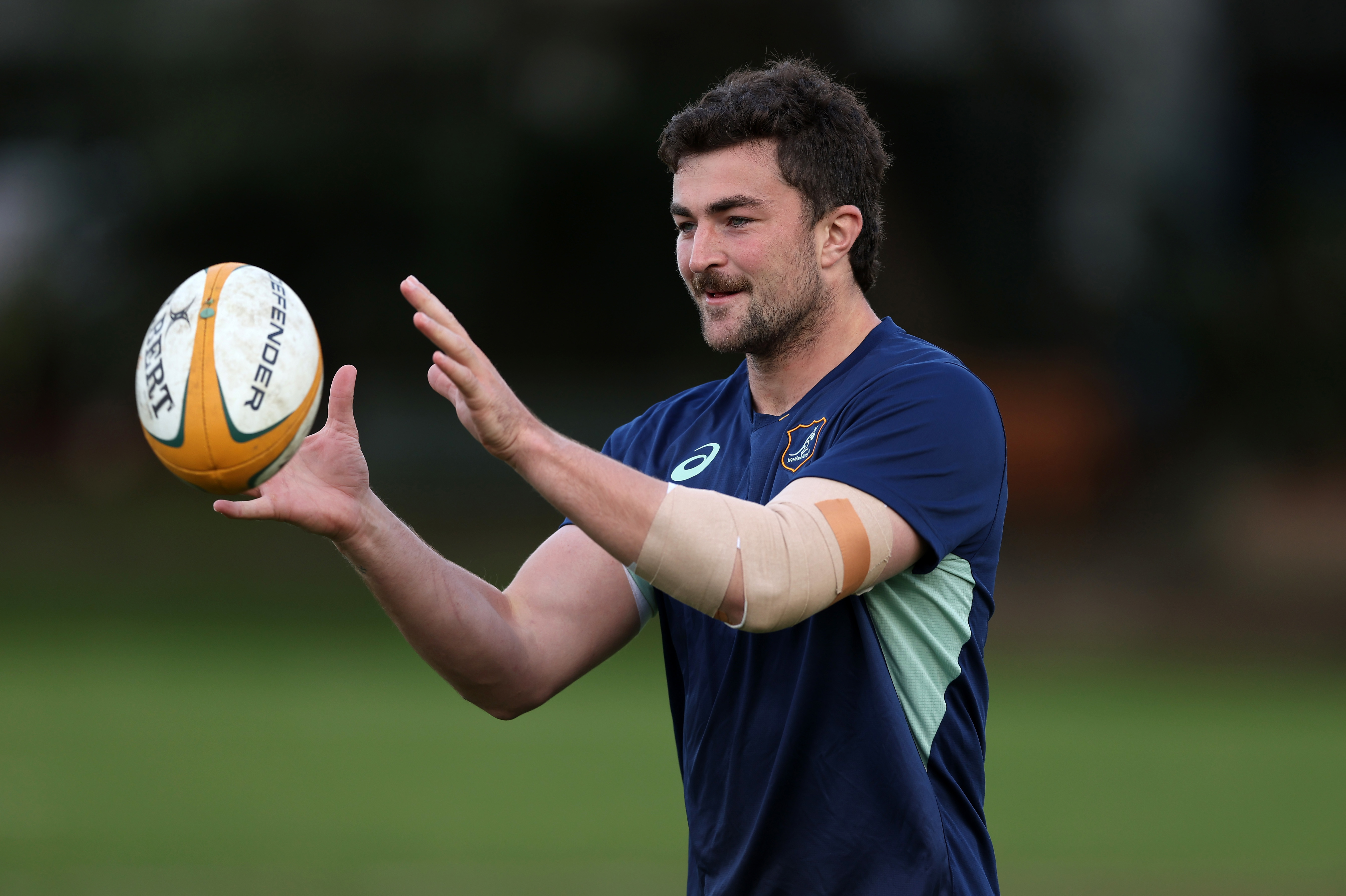 Jeremy Williams handles the ball during a Wallabies training session at David Phillips Sports Complex.