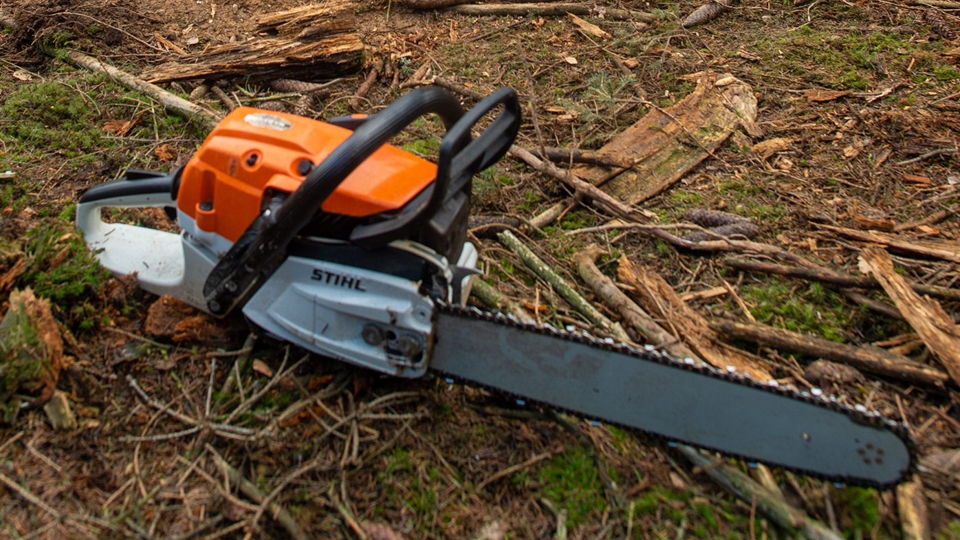A man has been attacked with an electric chainsaw and another bitten several times following an argument stemming from a loud party in Queensland. 