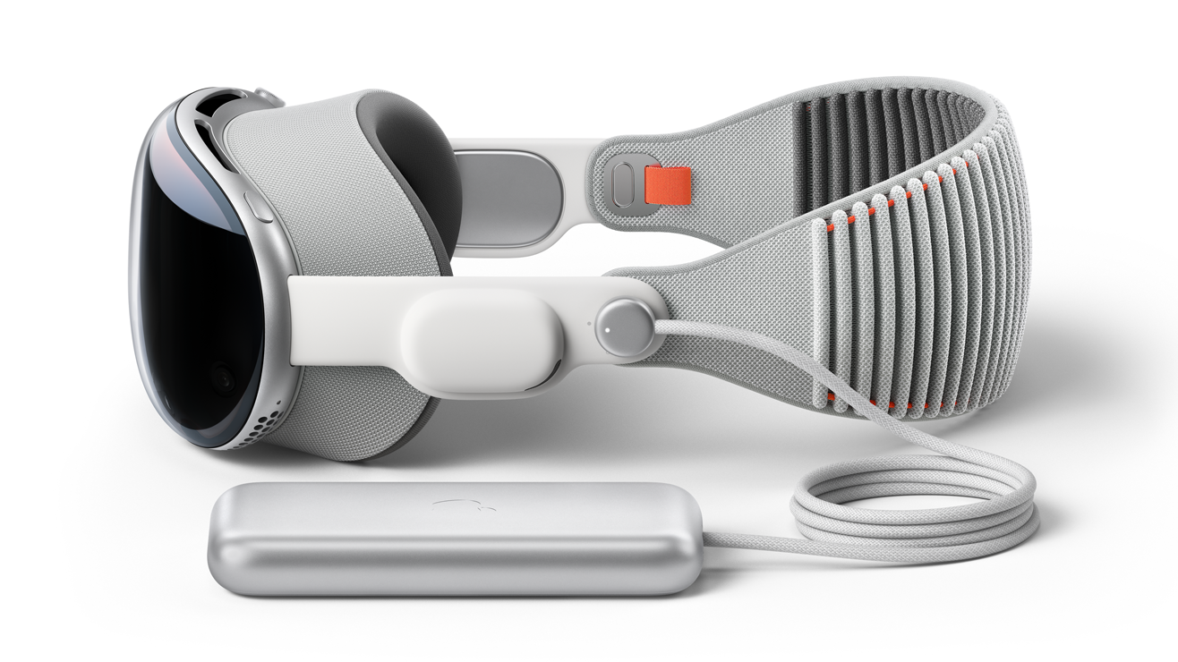 Auriculares de realidad mixta Apple Vision Pro.  El auricular se carga con un banco de carga portátil