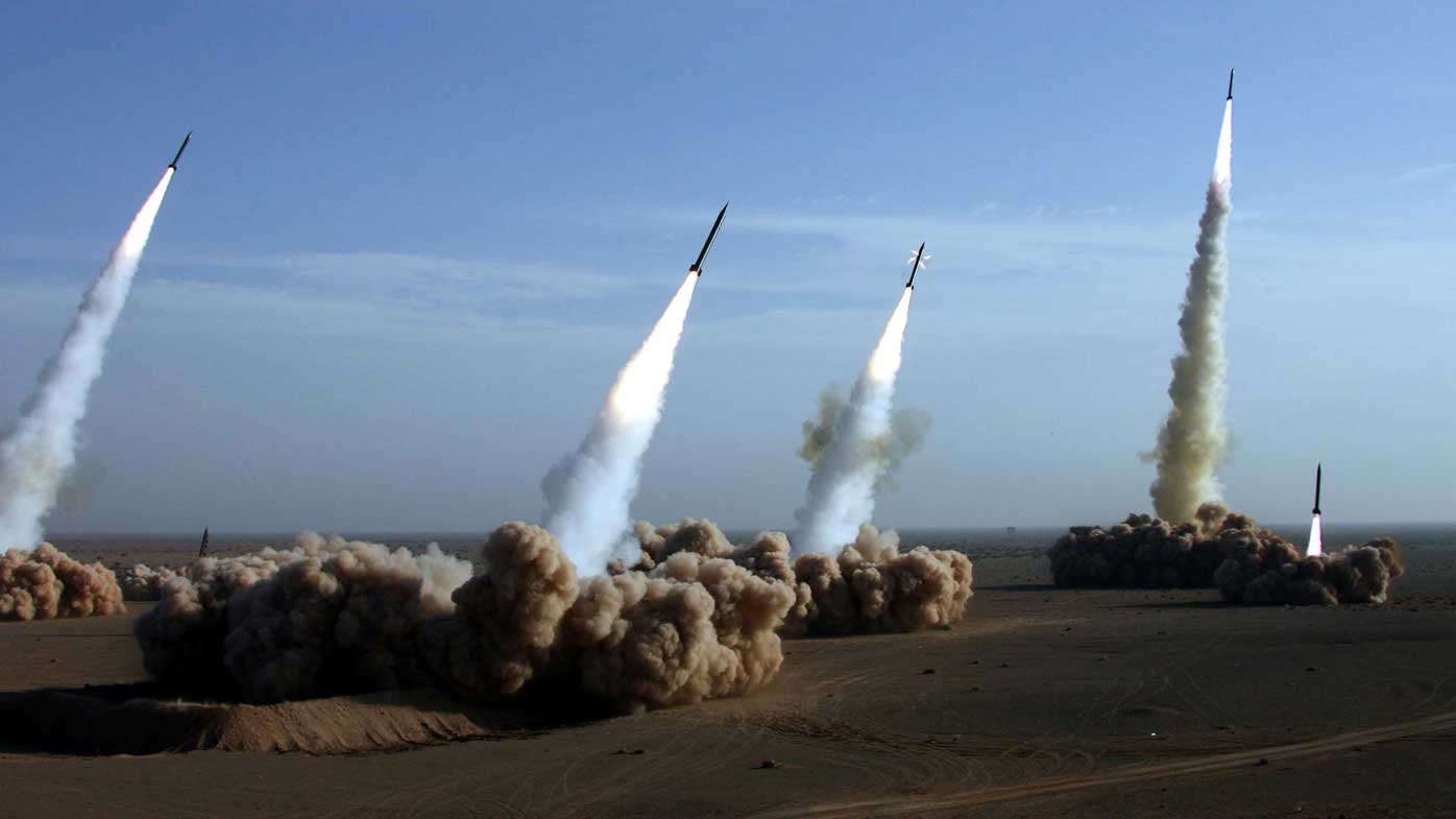 Iran's elite Revolutionary Guards tests missiles during maneuvers in a central desert area of Iran.