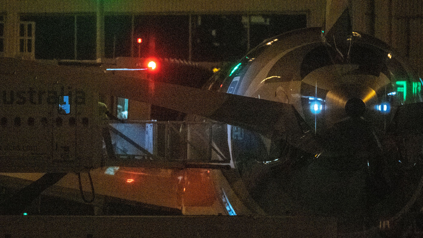 A person believed to be Malka Leifer walks off a plane at Melbourne Airport on January 27, 2021 in Melbourne, Australia