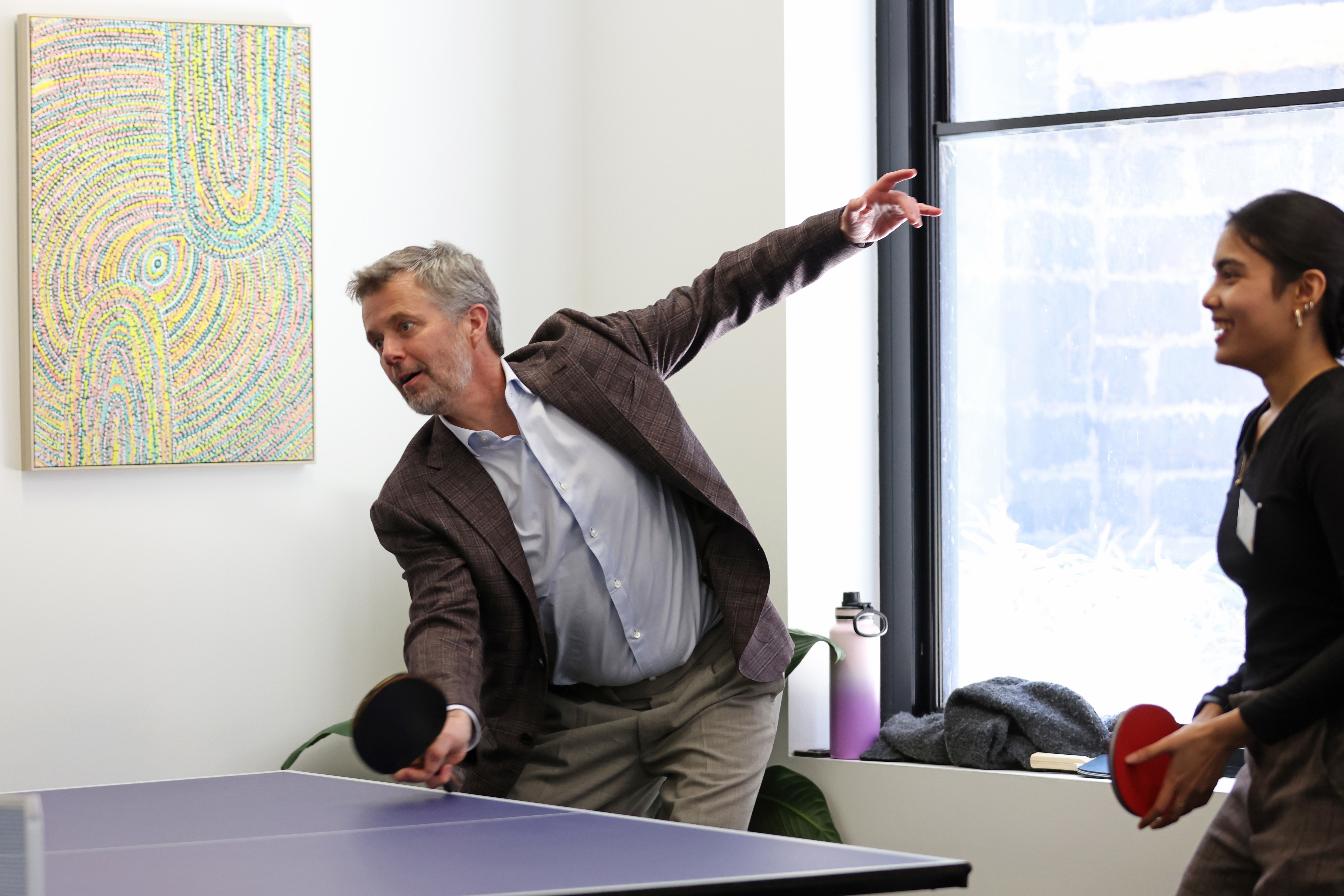 MELBOURNE, AUSTRALIA - MARCH 18: King Frederik X of Denmark plays table tennis during his visit at the Headspace National Youth Reference Group and Headspace South Melbourne Youth Advisory Group on March 18, 2026 in Melbourne, Australia. Denmark's King Frederik X and Queen Mary are on a five-day state visit to Australia. (Photo by Jesse Thompson - Pool/Getty Images)