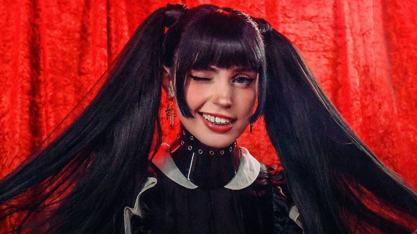 Australian musician Mia Rodriguez wearing a custom set of grillz from Dr Grillz.