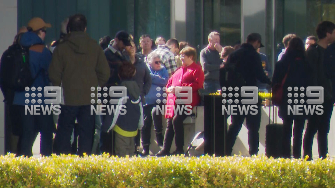 People outside after the Canberra Airport shooting.