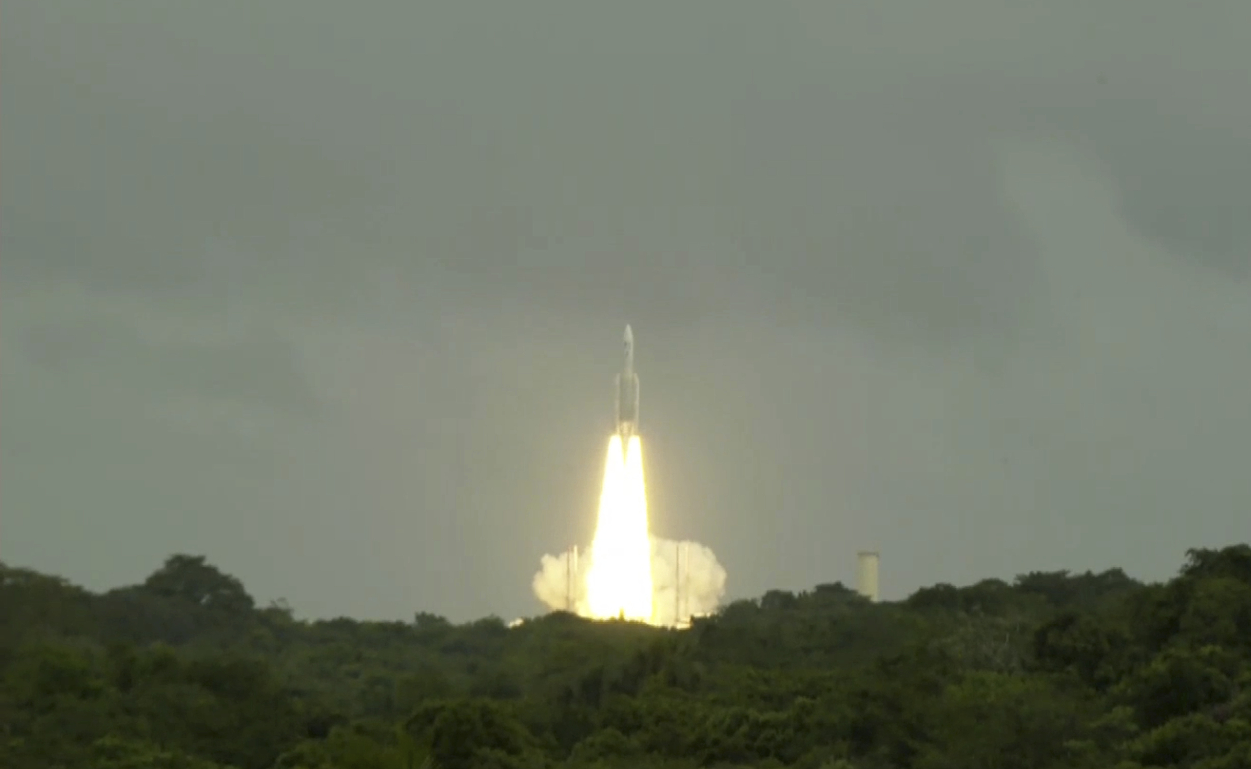 This photo provided by the European Space Agency shows an Ariane 5 rocket carrying the Jupiter Icy Moons Explorer, Juice, spacecraft lifting off from Europe's Spaceport in Kourou, French Guiana, Friday, April 14, 2023