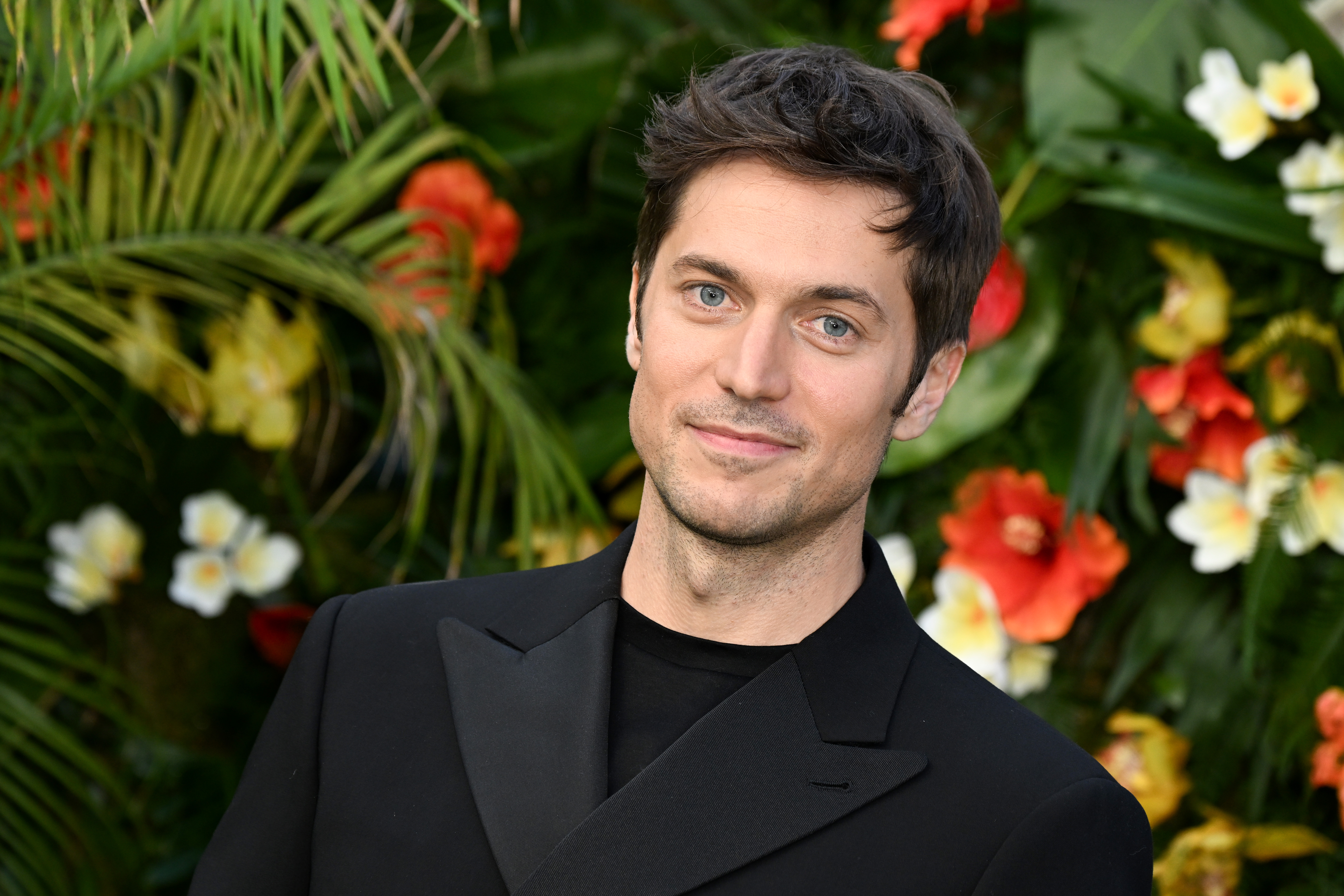 Lucas Bravo attends the World Premiere of "Ticket to Paradise" at Odeon Luxe Leicester Square on September 07, 2022 in London, England. 