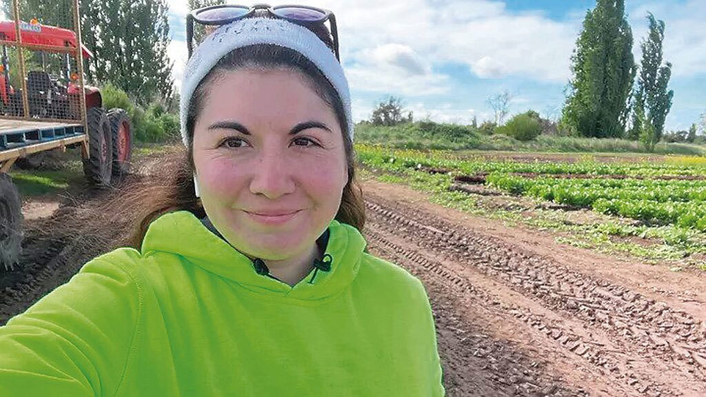 Lisbett Lillo works as a tractor driver on a vegetable farm.