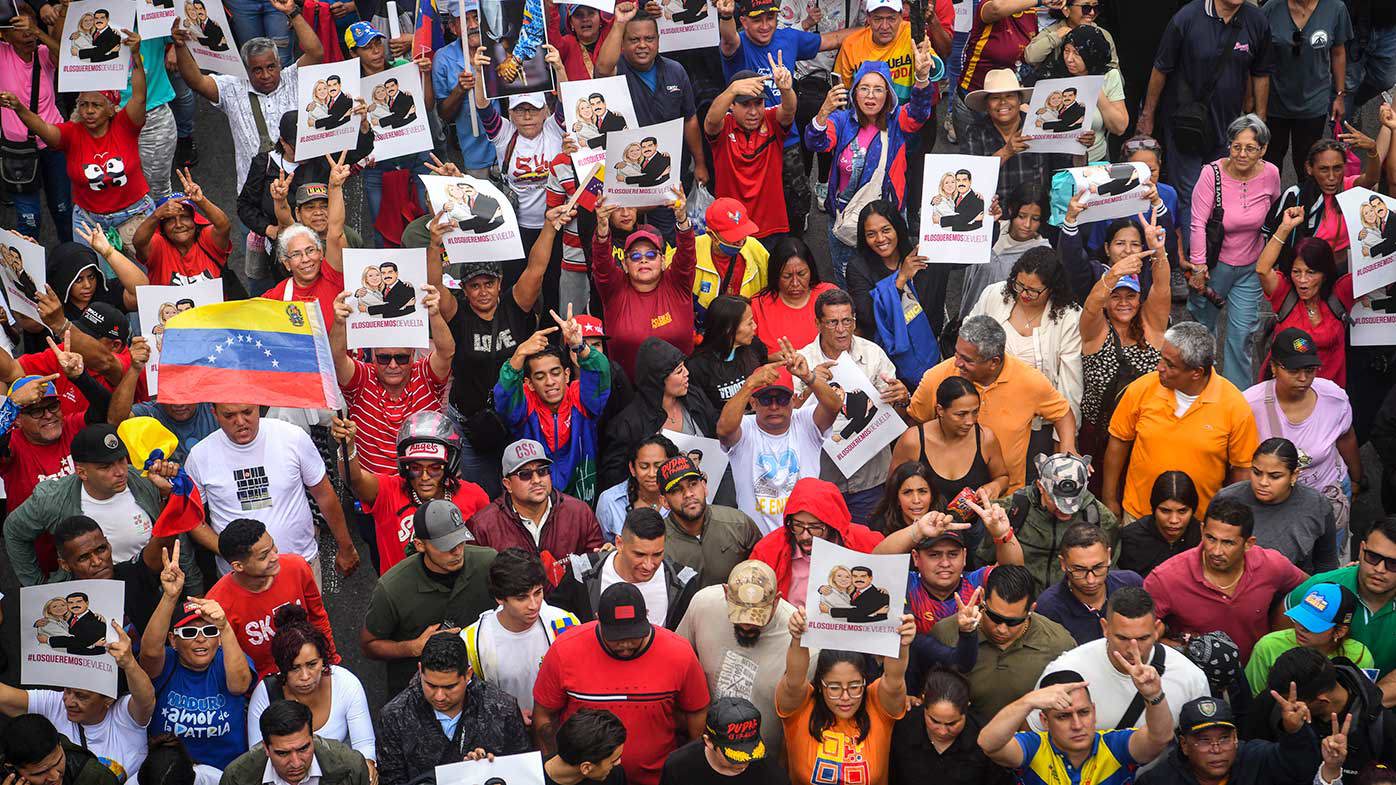 Supporters of Maduro march in Caracas in support of the ousted president.