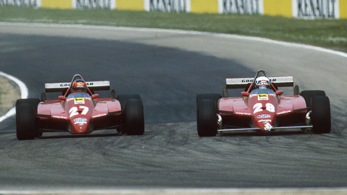 Gilles Villeneuve (27) and his Ferrari teammate Didier Pironi (28) battle for position during the 1982 San Marino Grand Prix.