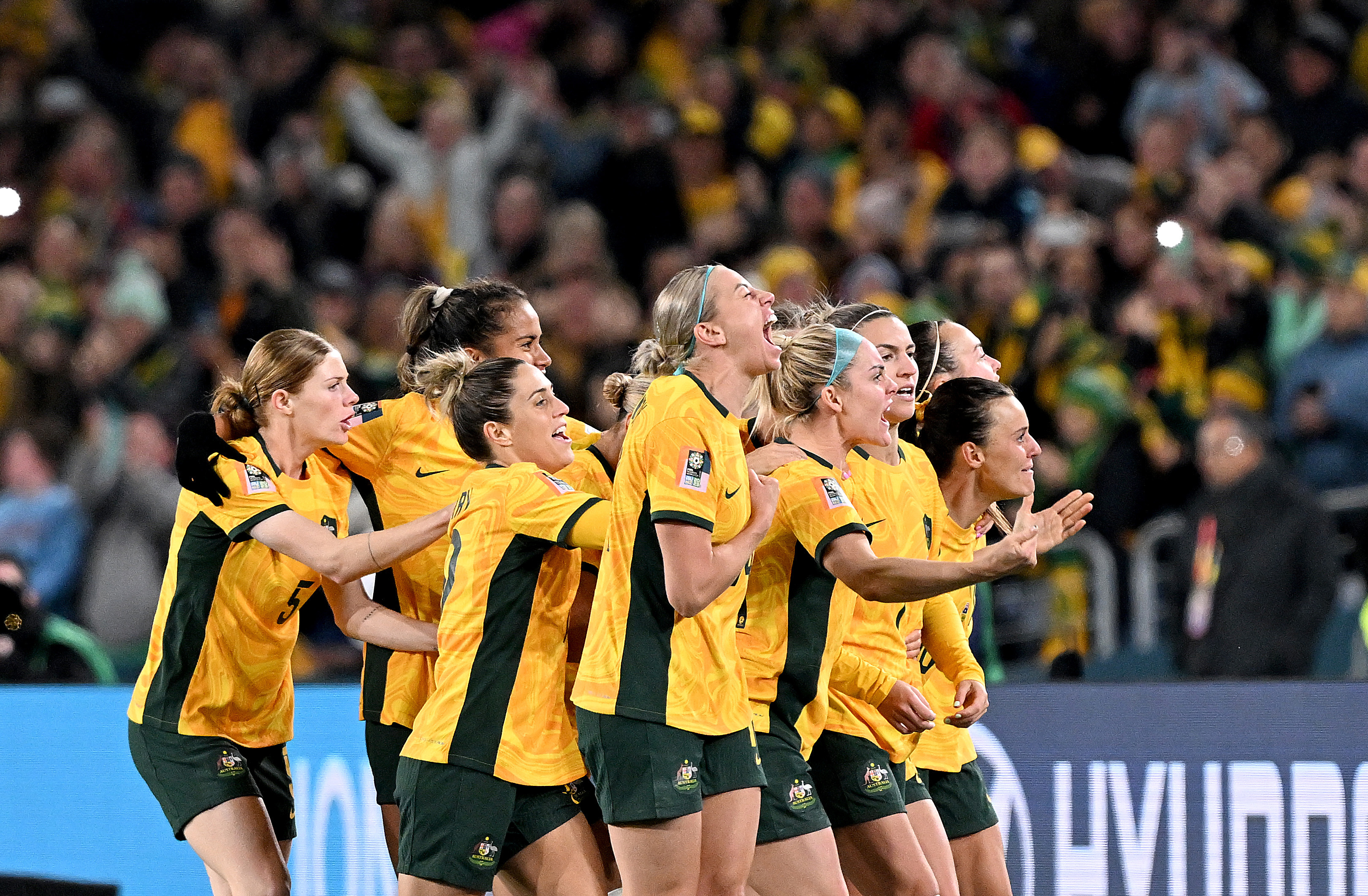 SYDNEY, AUSTRALIA - JULY 20: Steph Catley of the Matildas celebrates with her team mates after scoring a goal during the FIFA Women's World Cup Australia & New Zealand 2023 Group B match between Australia and Ireland at Stadium Australia on July 20, 2023 in Sydney, Australia. (Photo by Bradley Kanaris/Getty Images)