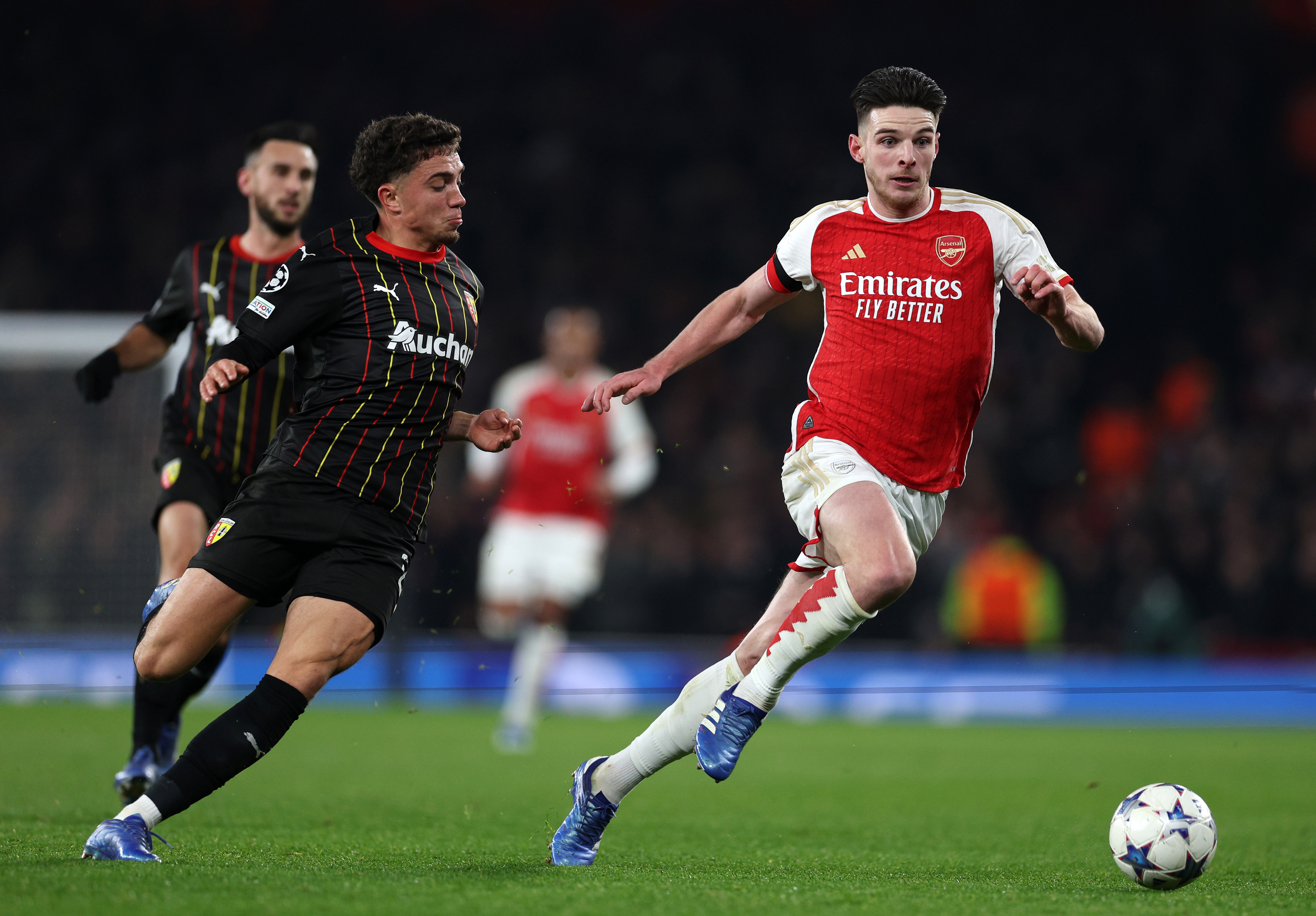 Declan Rice of Arsenal battles for possession with Neil El Aynaoui of Lens.