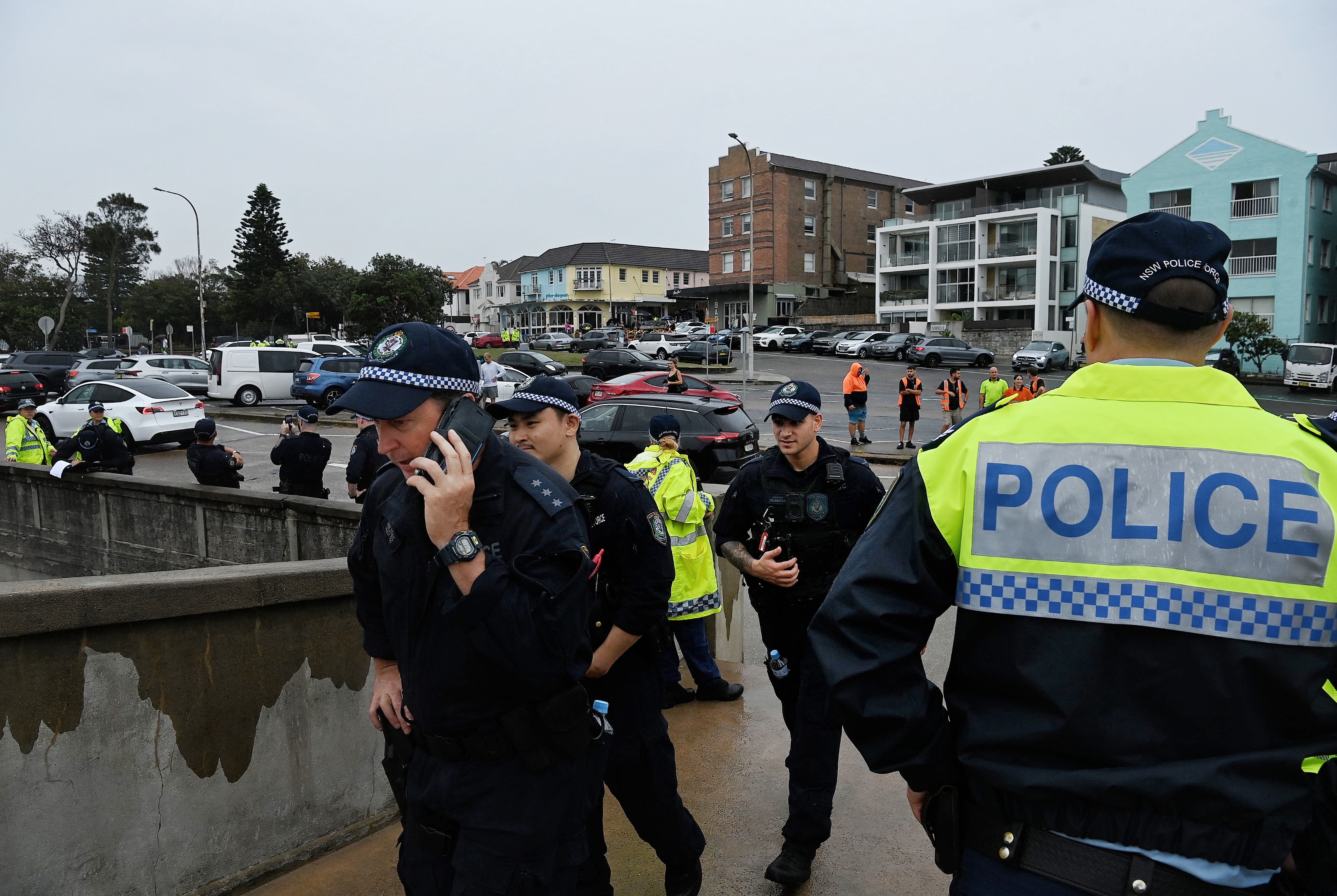 EMBARGO TILL 11:30AM EVENT IS UNDERWAY  NSW police walk over the pedestrian bridge  near the Bondi Pavilion ahead of Israeli President Isaac Herzogs visit to Bondi Pavilion. Bondi Beach, NSW. February 9, 2026. Photo: Kate Geraghty