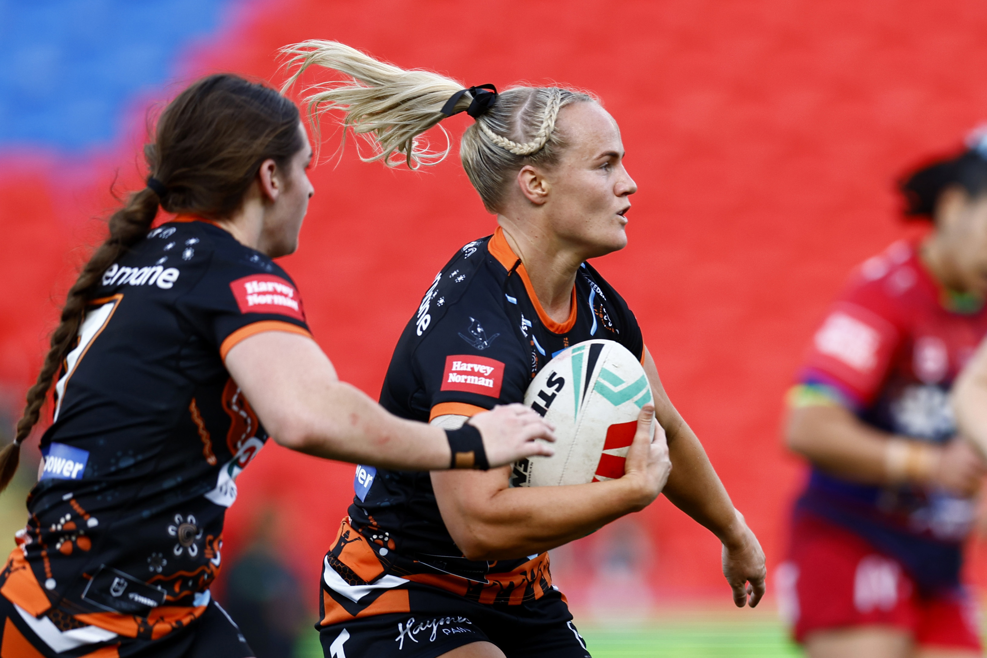 Wests Tigers NRLW star Emily-Claire Bass on the field.