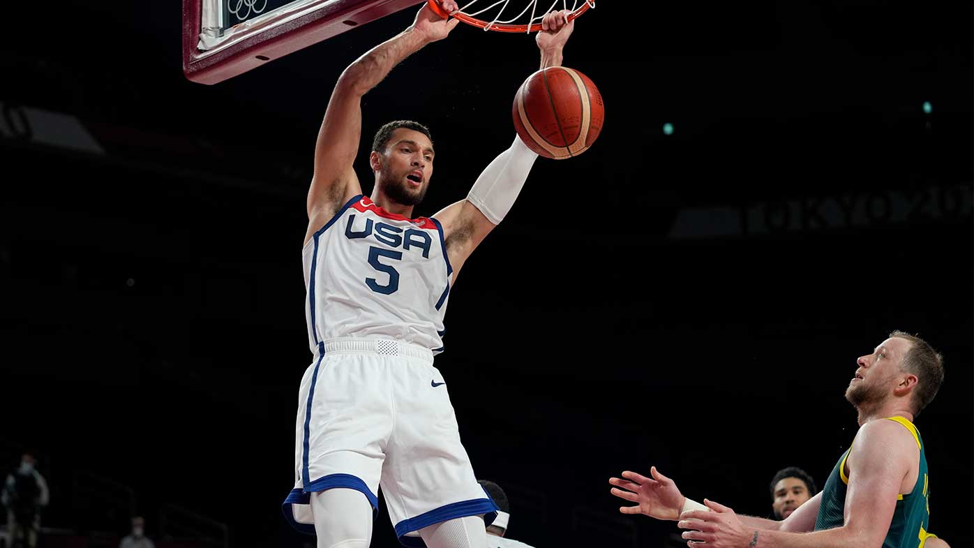 United States's Zachary Lavine scores over Australia's Joe Ingles.