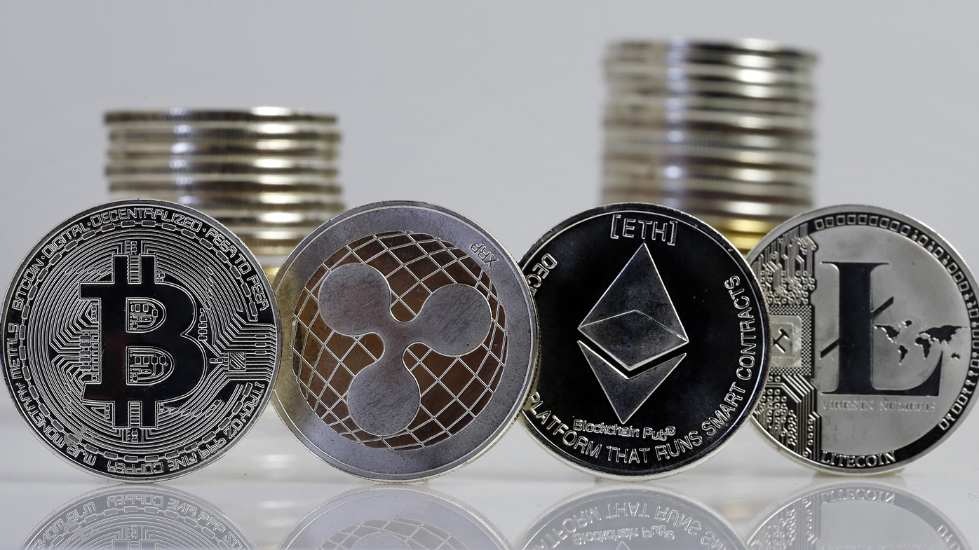 Bitcoin tumbles more than 50 per cent below its all-time high as crypto  plunges again