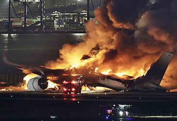 Japan Airlines flight 516 ablaze on airport tarmac (AP)