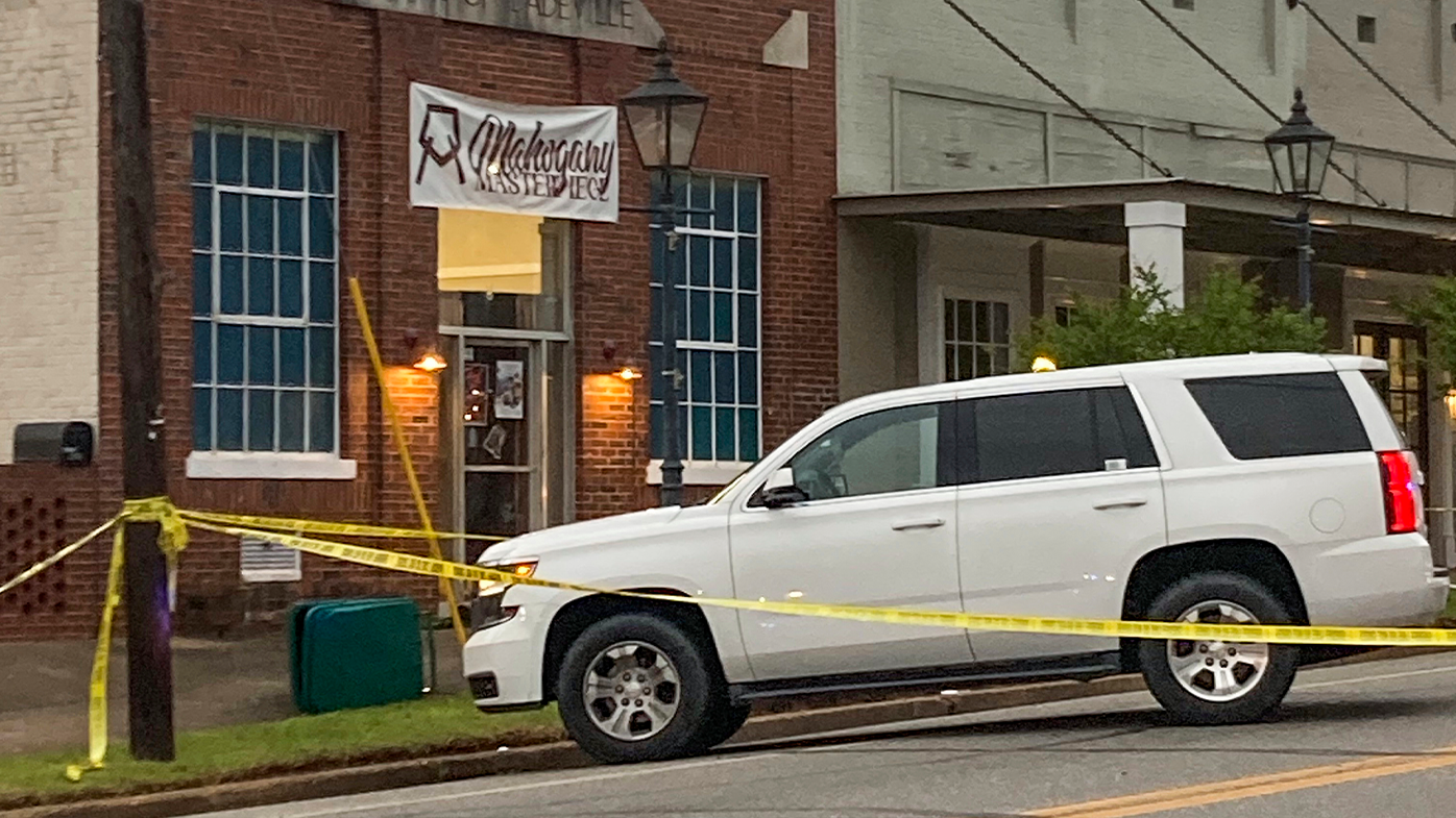 nvestigators work at the site of a fatal shooting in downtown Dadeville, Ala., on Sunday, April 16, 2023.