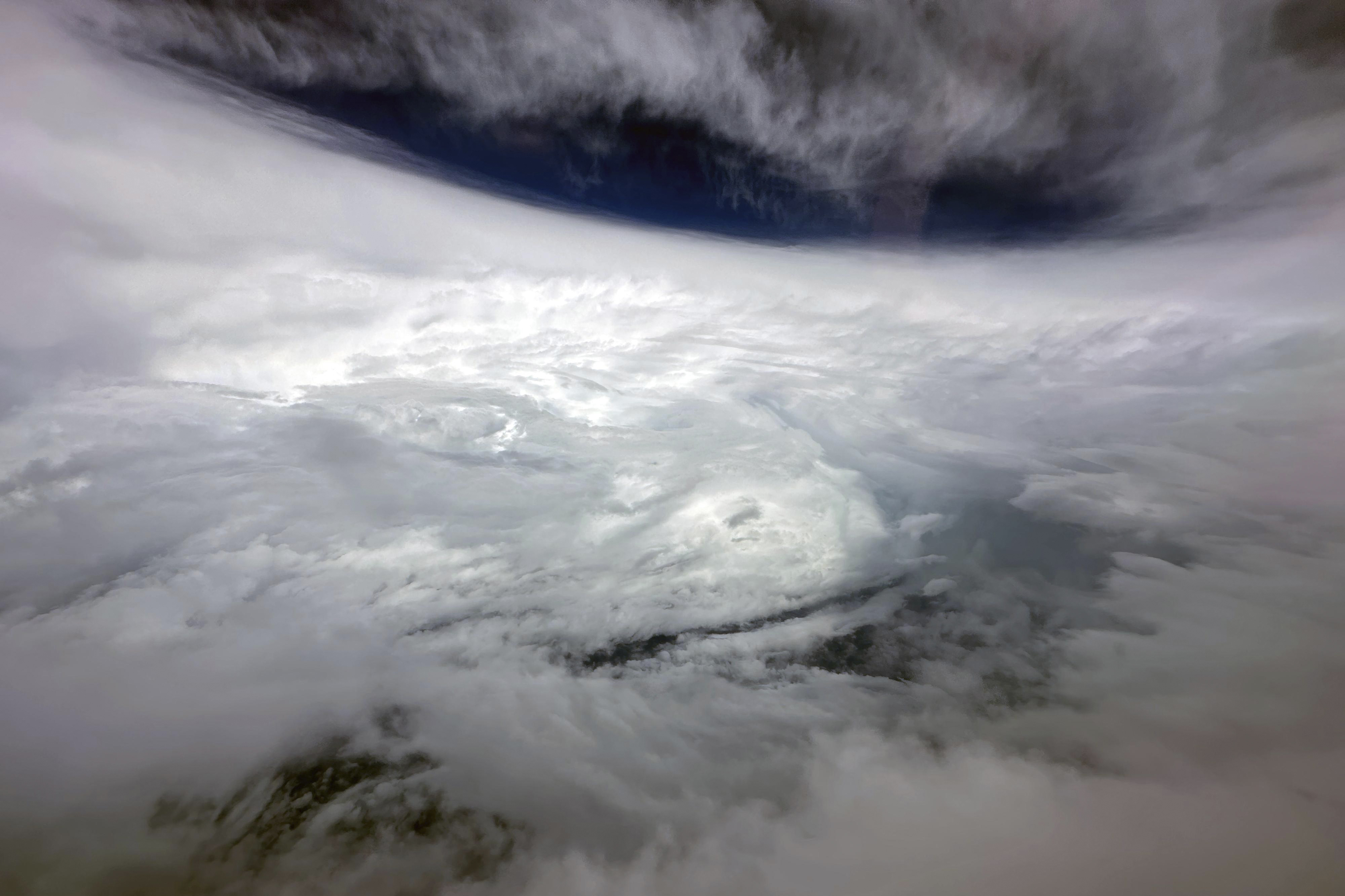 In this photo released by Hong Kong's Information Services Department, super typhoon Saola is seen from a Challenger 605 fixed-wing aircraft dispatched by the Government Flying Service near Hong Kong on Friday, Sept. 1, 2023.