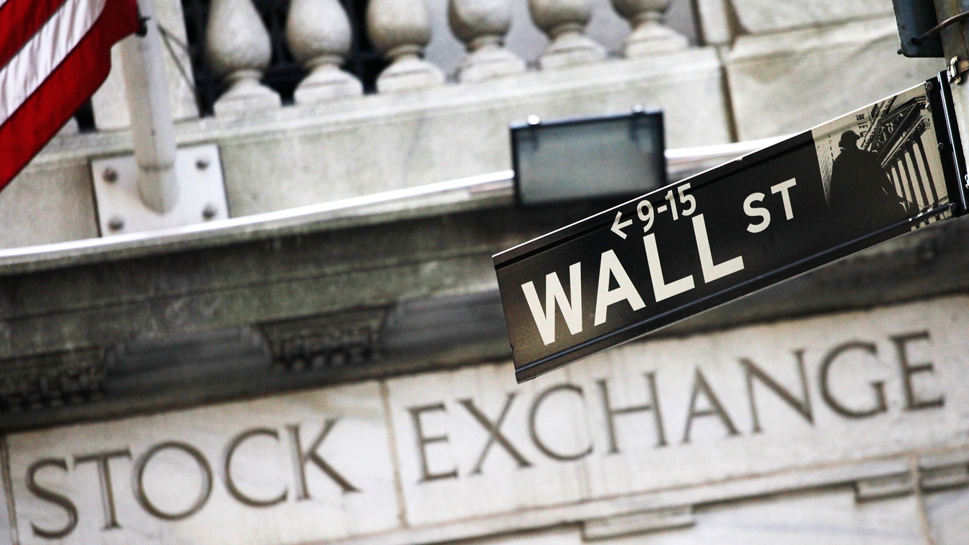 A street sign for Wall Street outside the New York Stock Exchange in New York.