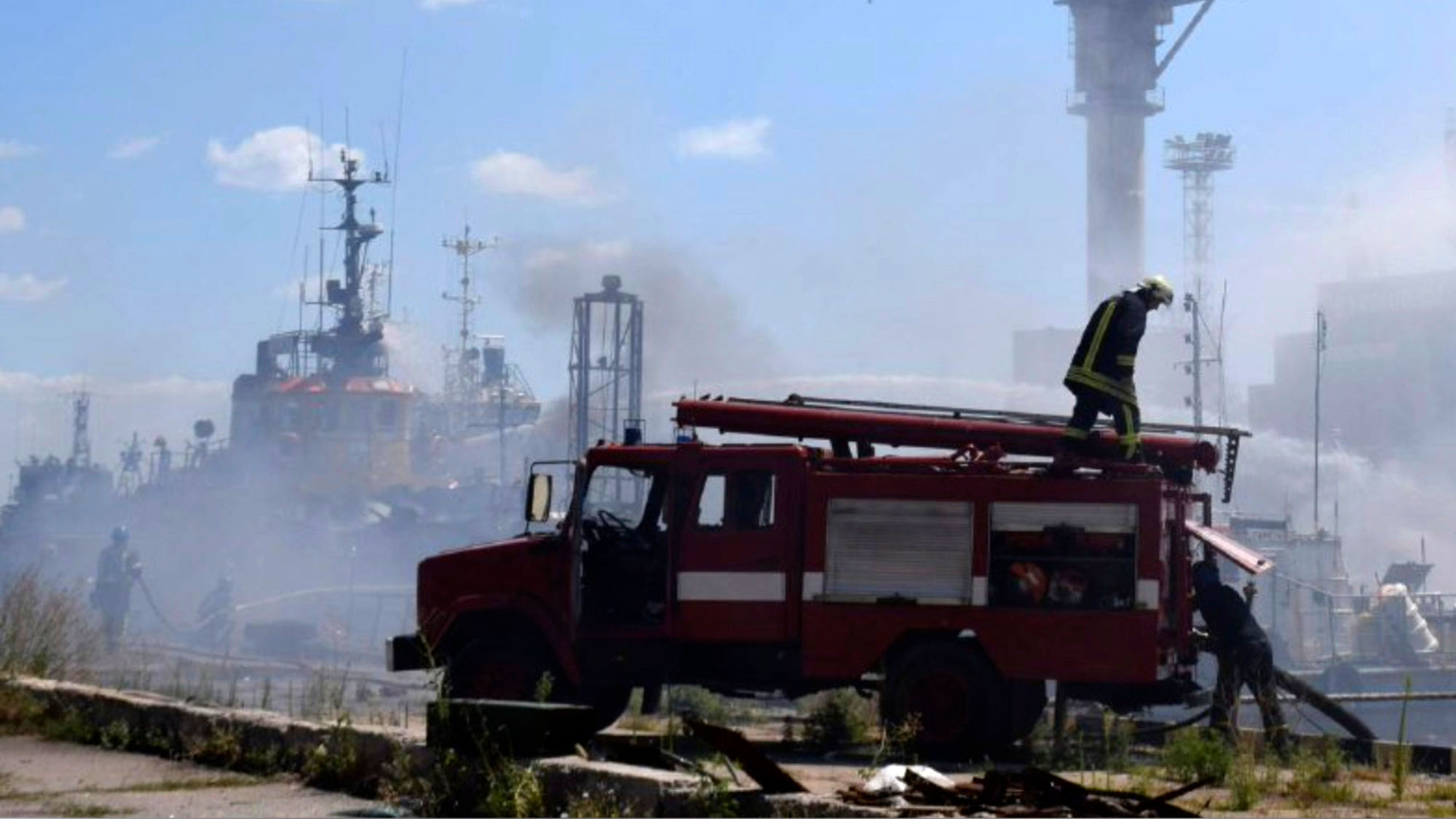 Firefighters put out a fire in the port after a Russian missiles attack in Odesa