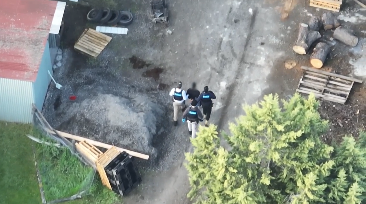 One of the men was cornered near the grow houses, handcuffed and taken into custody.﻿