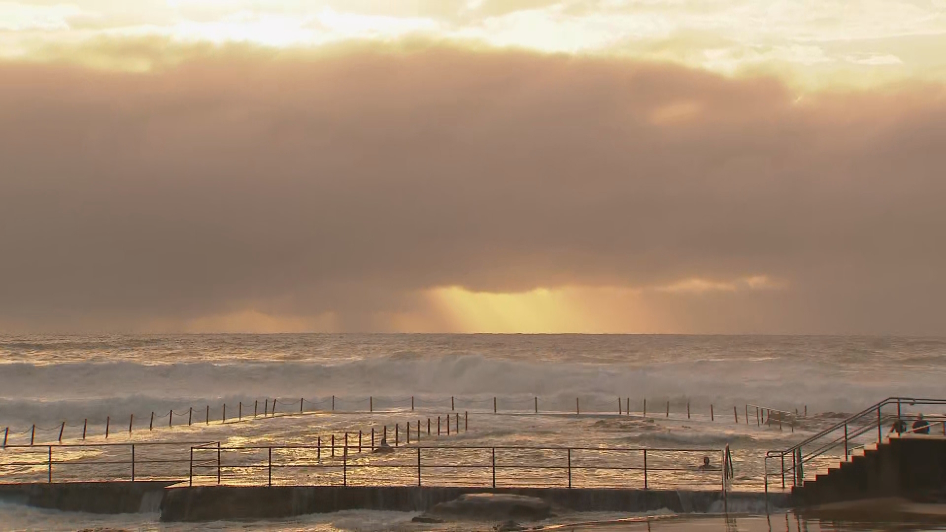 Sunrise on Cronulla Beach as waves continue to rise throughout the day.
