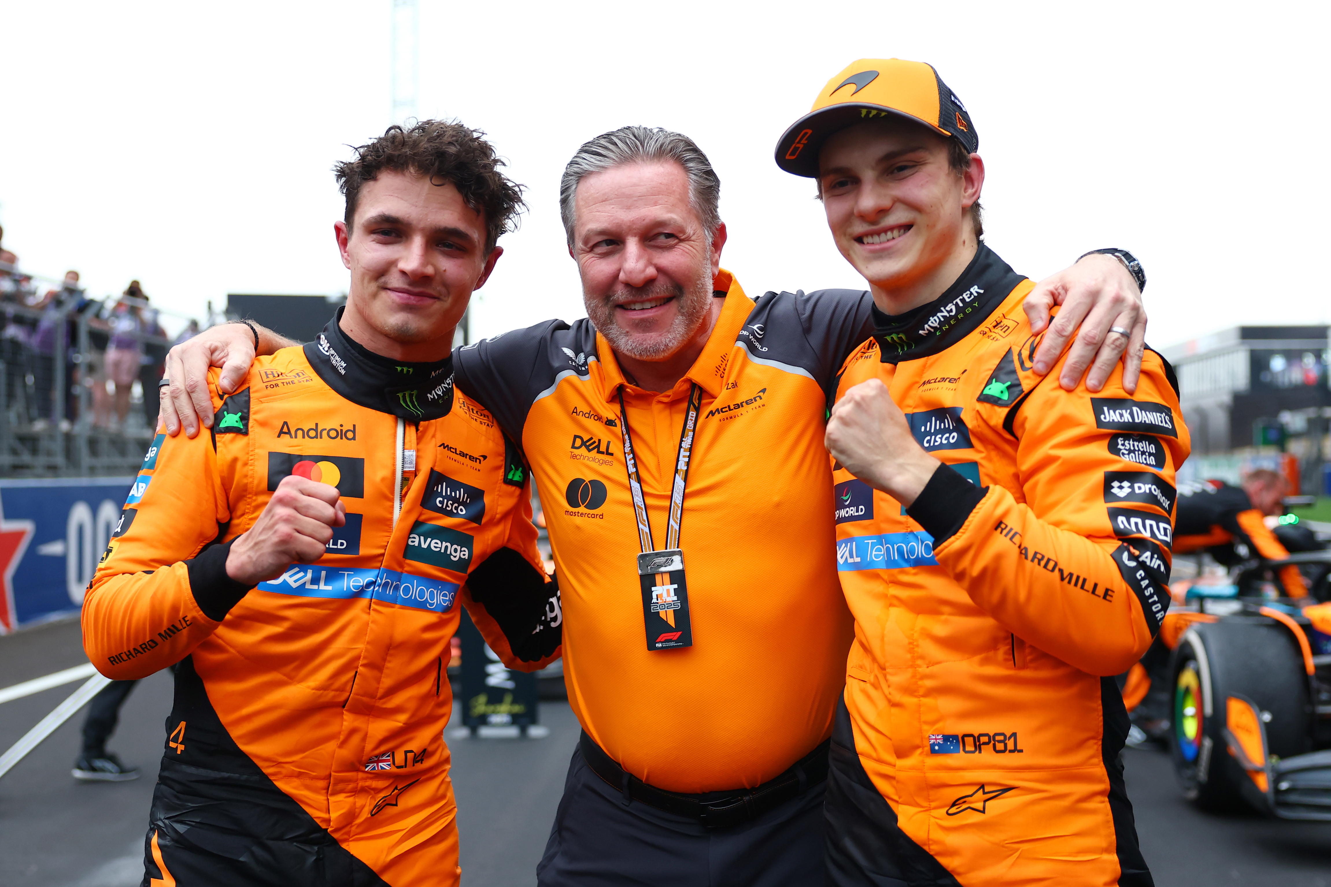 Lando Norris, Zak Brown and Oscar Piastri after the Chinese Grand Prix.
