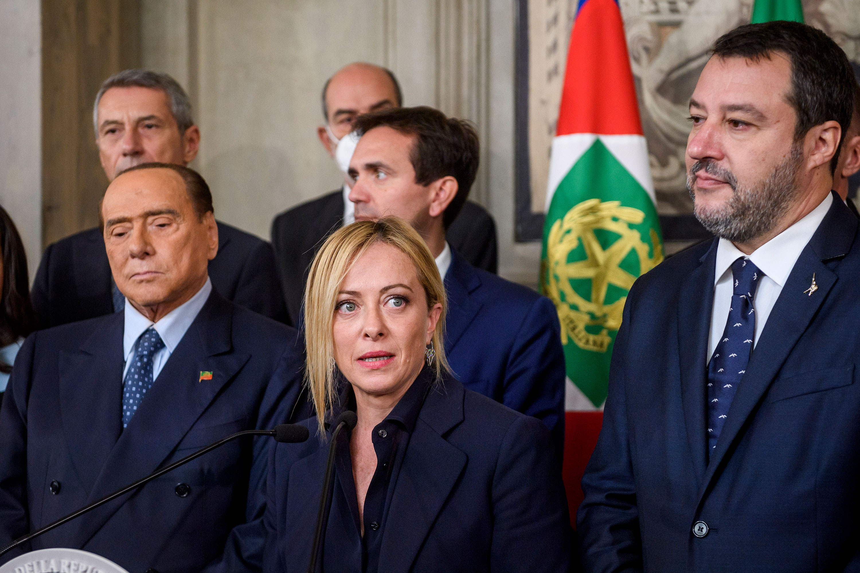 Silvio Berlusconi (left), Giorgia Meloni (centre), Matteo Salvini (right) and other members of right-wing coalition speak to the media after the meeting with Italian President Sergio Mattarella during the second day of consultations at Quirinale Palace, on October 21, 2022 in Rome, Italy. 