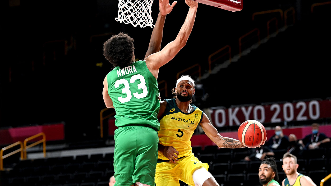 Patty Mills of Australia drives to the basket during the preliminary rounds of the Men's Basketball match between Australia and Nigeria on day two of the Tokyo 2020 Olympic Games at Saitama Super Arena on July 25, 2021 in Saitama, Japan. (Photo by Bradley Kanaris/Getty Images)