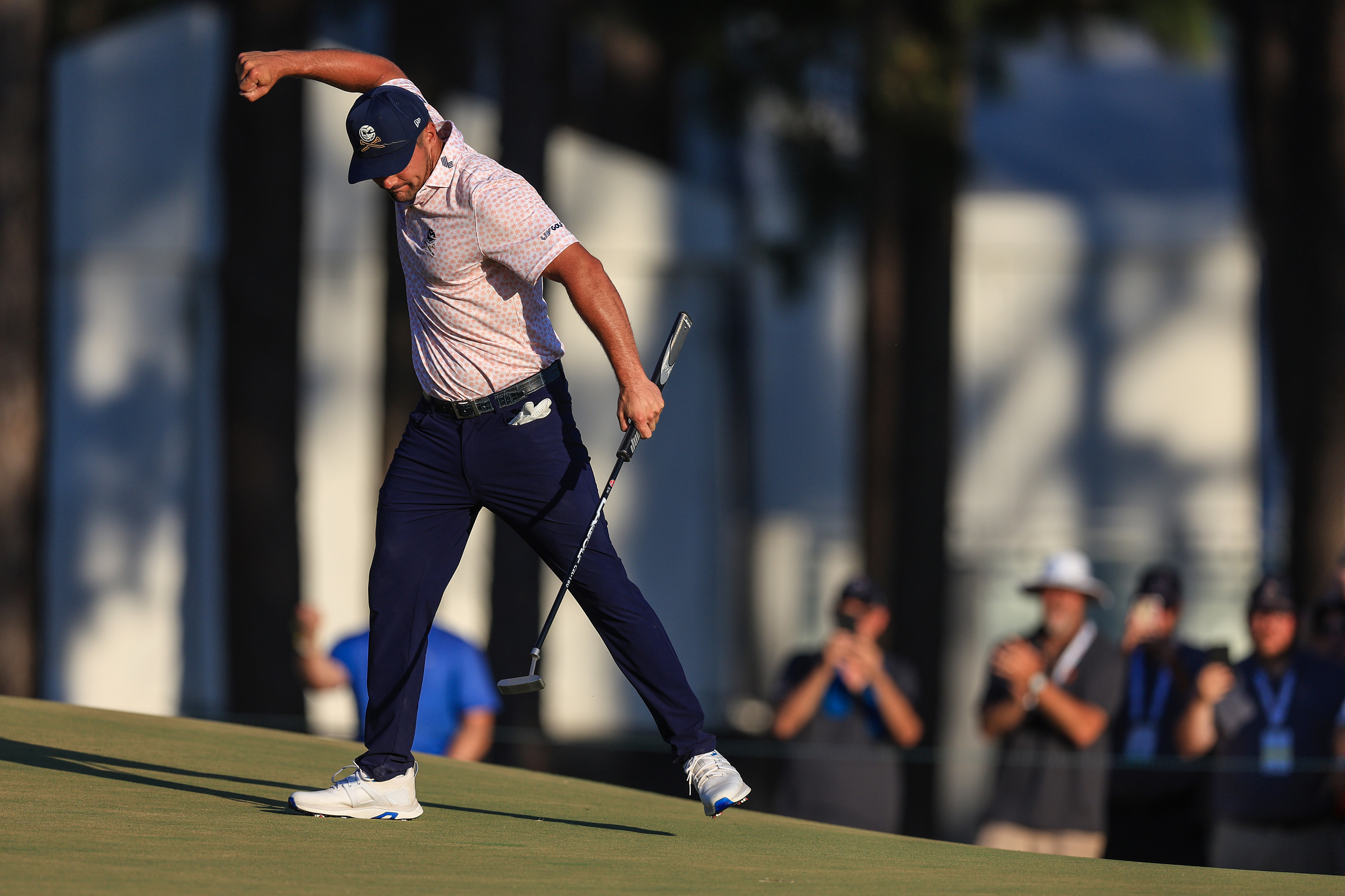 Bryson DeChambeau of the United States reacts after making a birdie on the 14th hole during the third round of the 124th U.S. Open at Pinehurst Resort on June 15, 2024 in Pinehurst, North Carolina. (Photo by Sean M. Haffey/Getty Images)