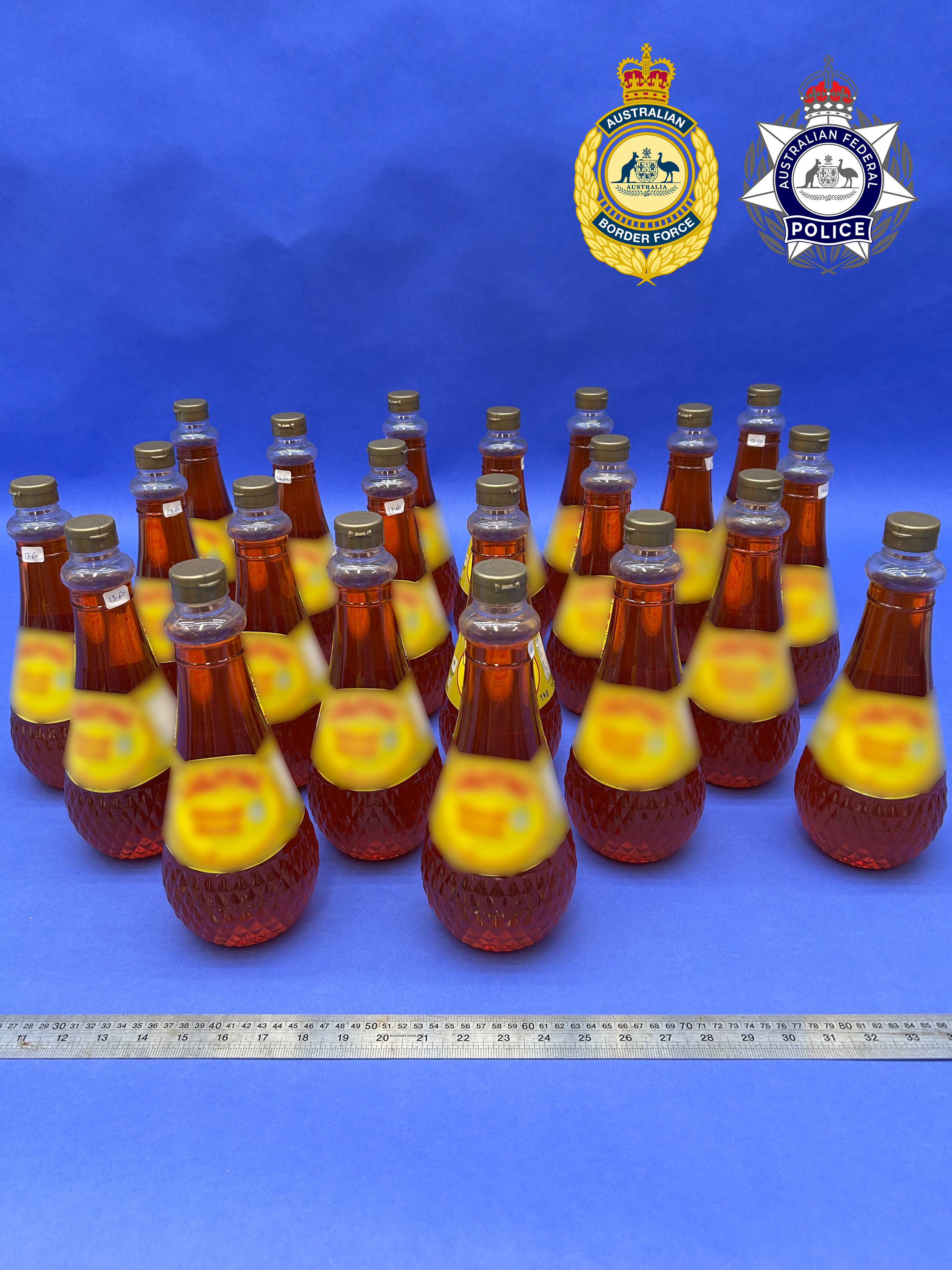 A drug-detecting dog returned a positive result for the bottles of cordial and oil, found in the shipment. 