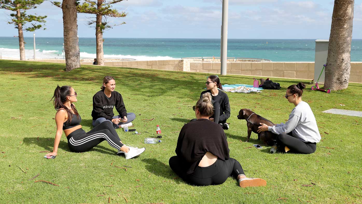 People are seen at Scarborough Beach in Perth.