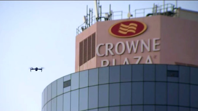The sneaky exchange was spotted by a hotel staff member who notified police and interviewed the quarantining woman. 