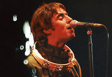 Liam Gallagher of Oasis performs at 1995 Glastonbury Festival (Pete Still/Getty)