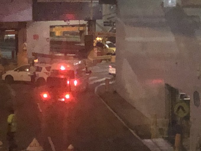 Police move into place to take Malka Leifer into custody after she was escorted off a plane on landing in Melbourne